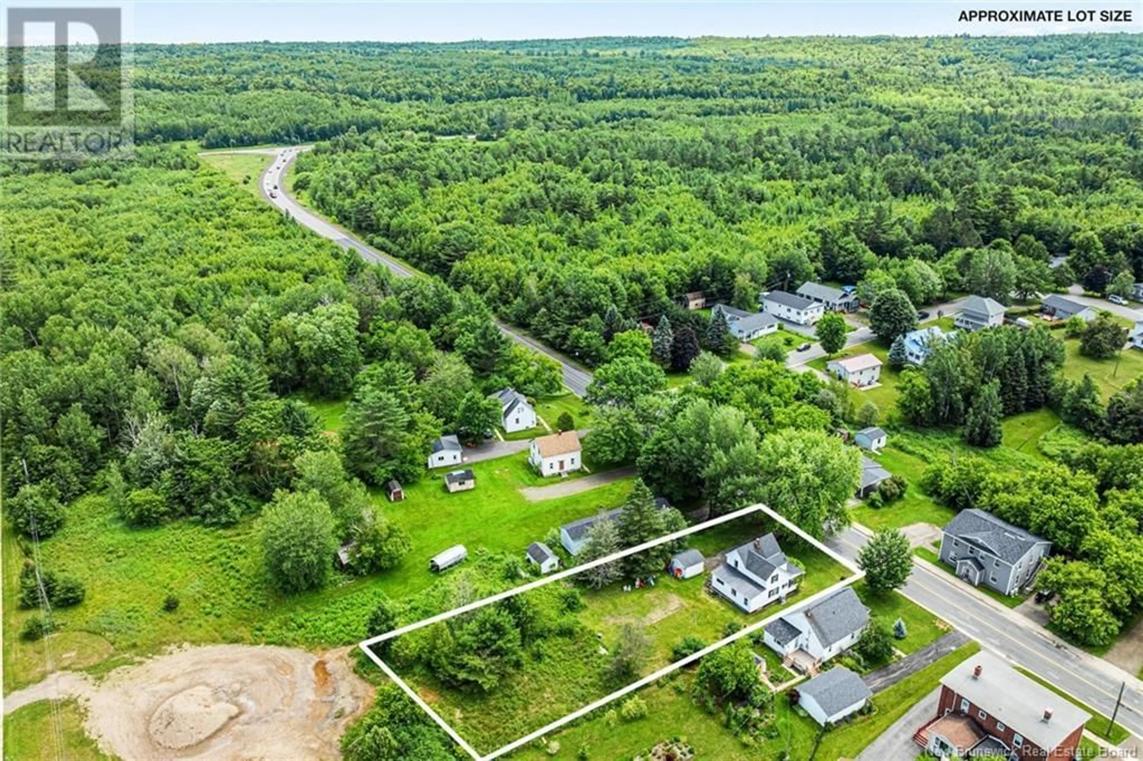 A pic from outside/outdoor area/front of a property/back of a property/a pic from drone, unknown for 71 BRIDGE STREET, Fredericton New Brunswick E3A4L4