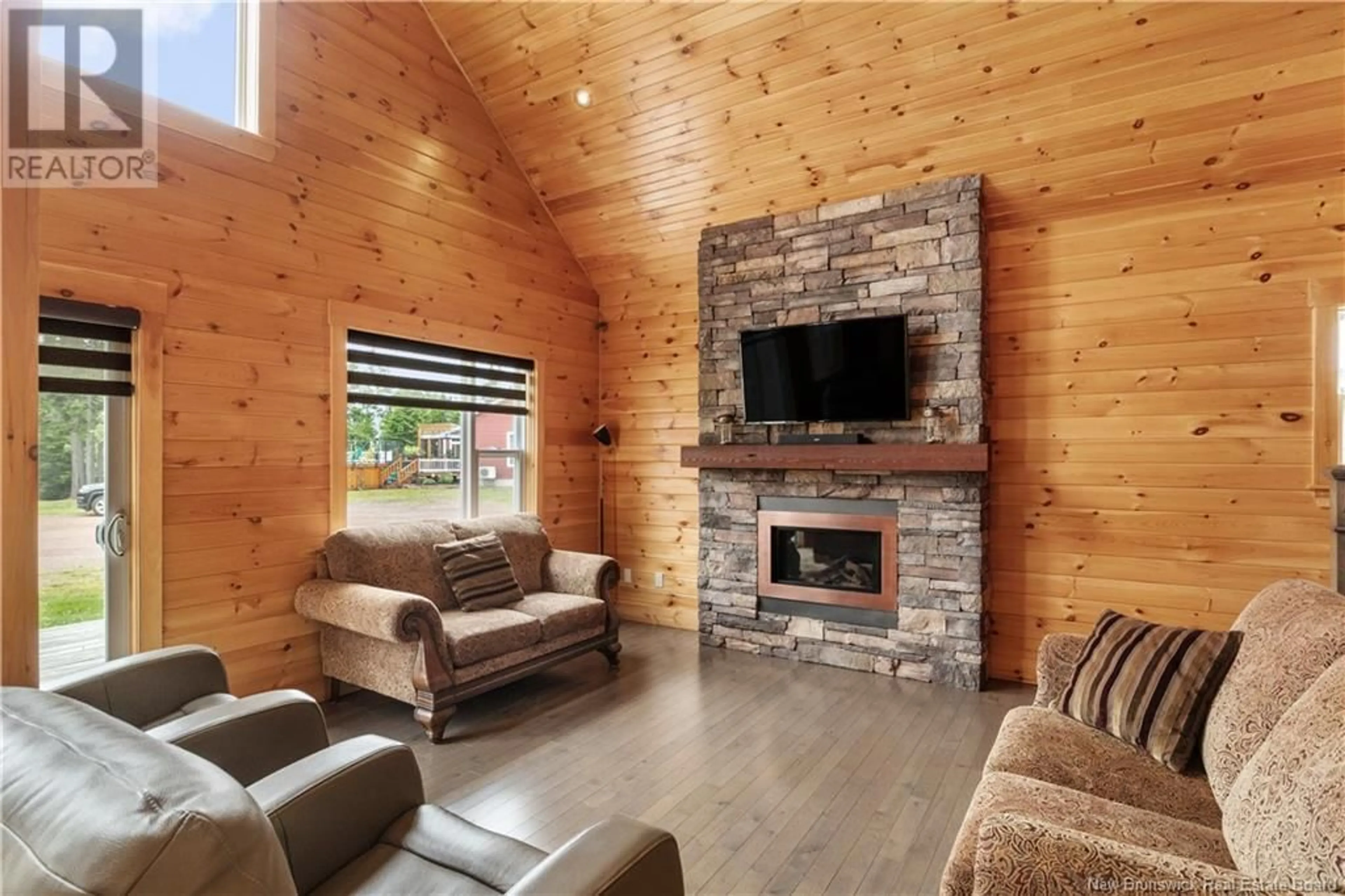 Living room with furniture, wood/laminate floor for 71 DES SCOUTS, Memramcook New Brunswick E4K0B2