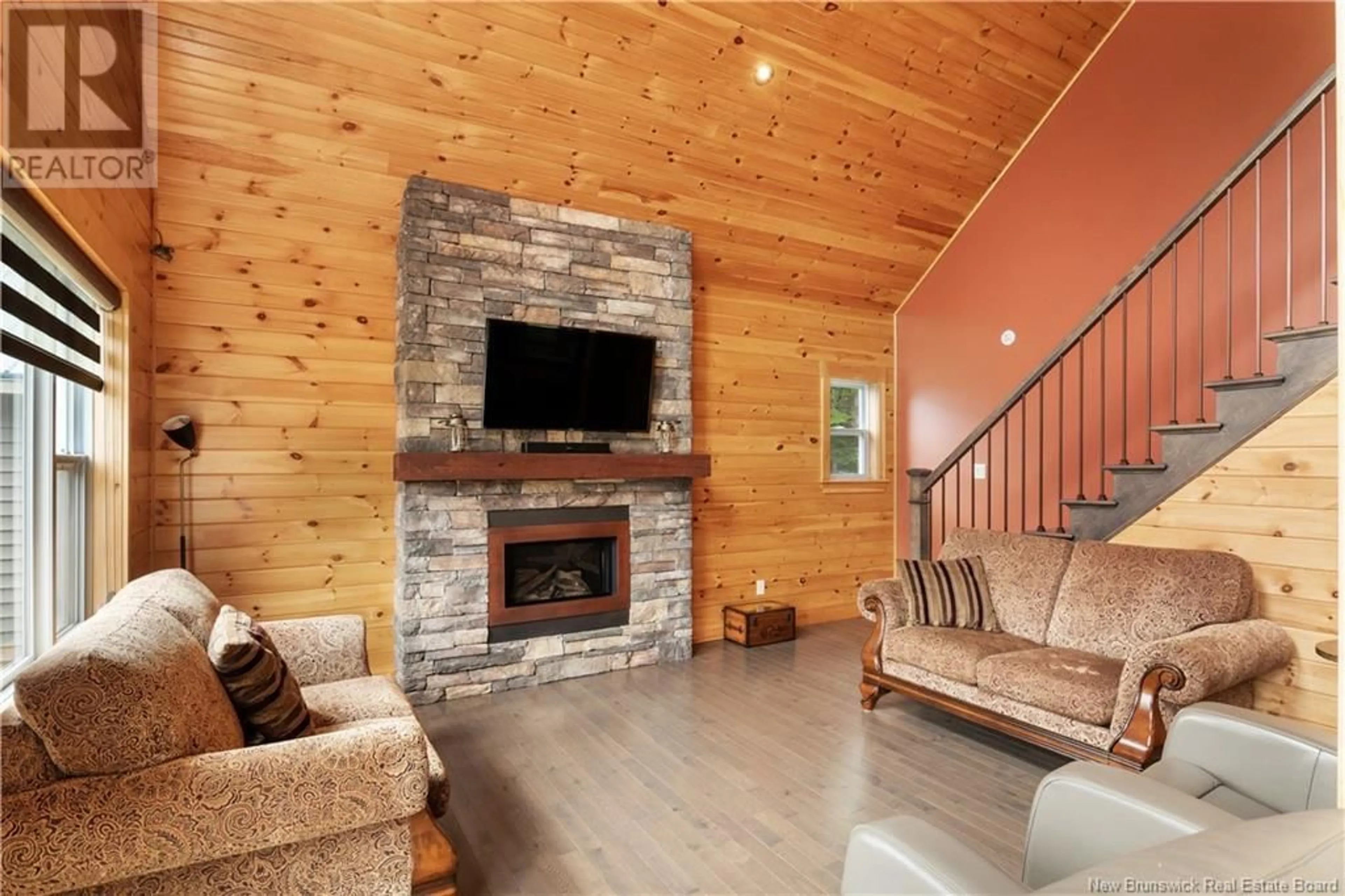 Living room with furniture, wood/laminate floor for 71 DES SCOUTS, Memramcook New Brunswick E4K0B2