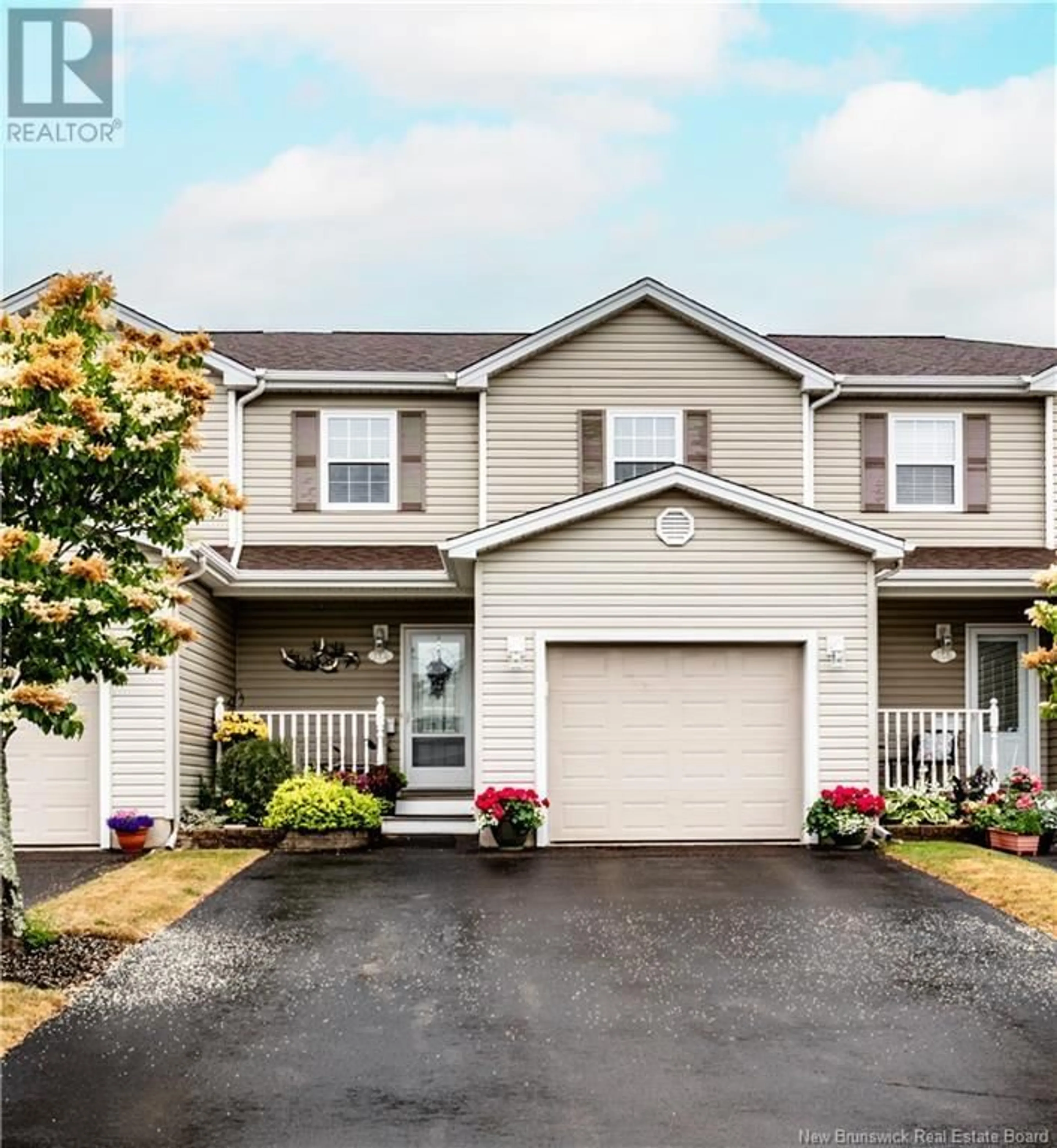 Home with vinyl exterior material, street for 5 - 114 DOMETHILDE, Dieppe New Brunswick E1A8R3