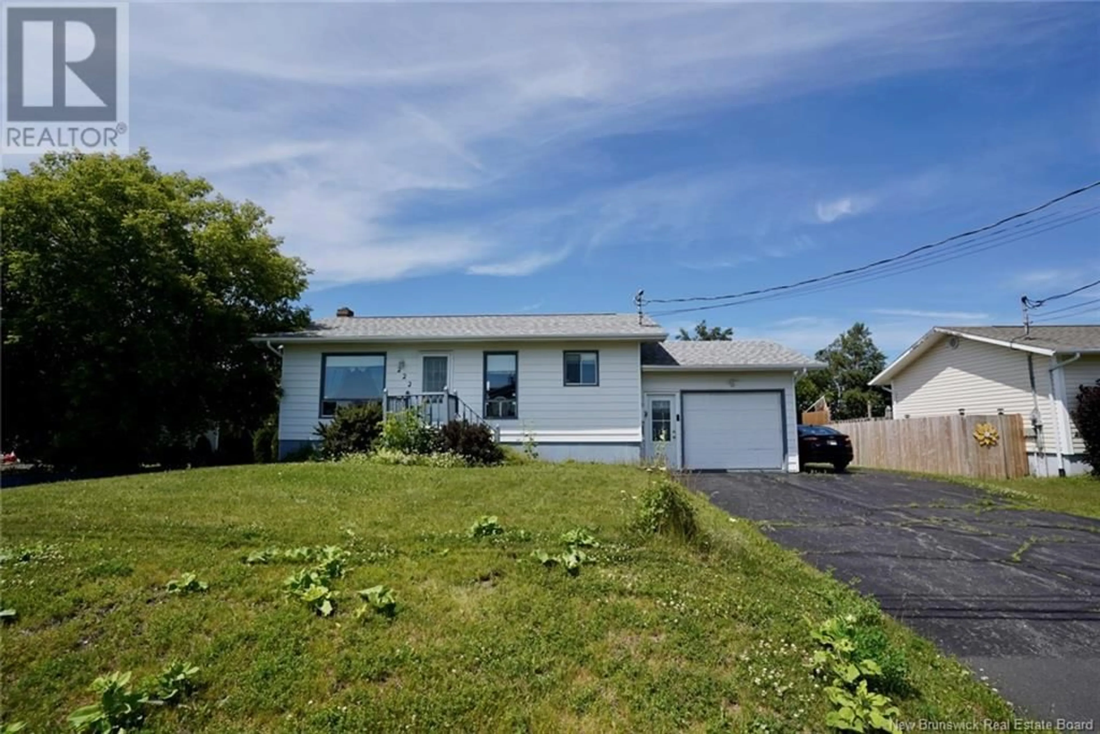 A pic from outside/outdoor area/front of a property/back of a property/a pic from drone, street for 222 RUE GAGNON, Beresford New Brunswick E8K1V3