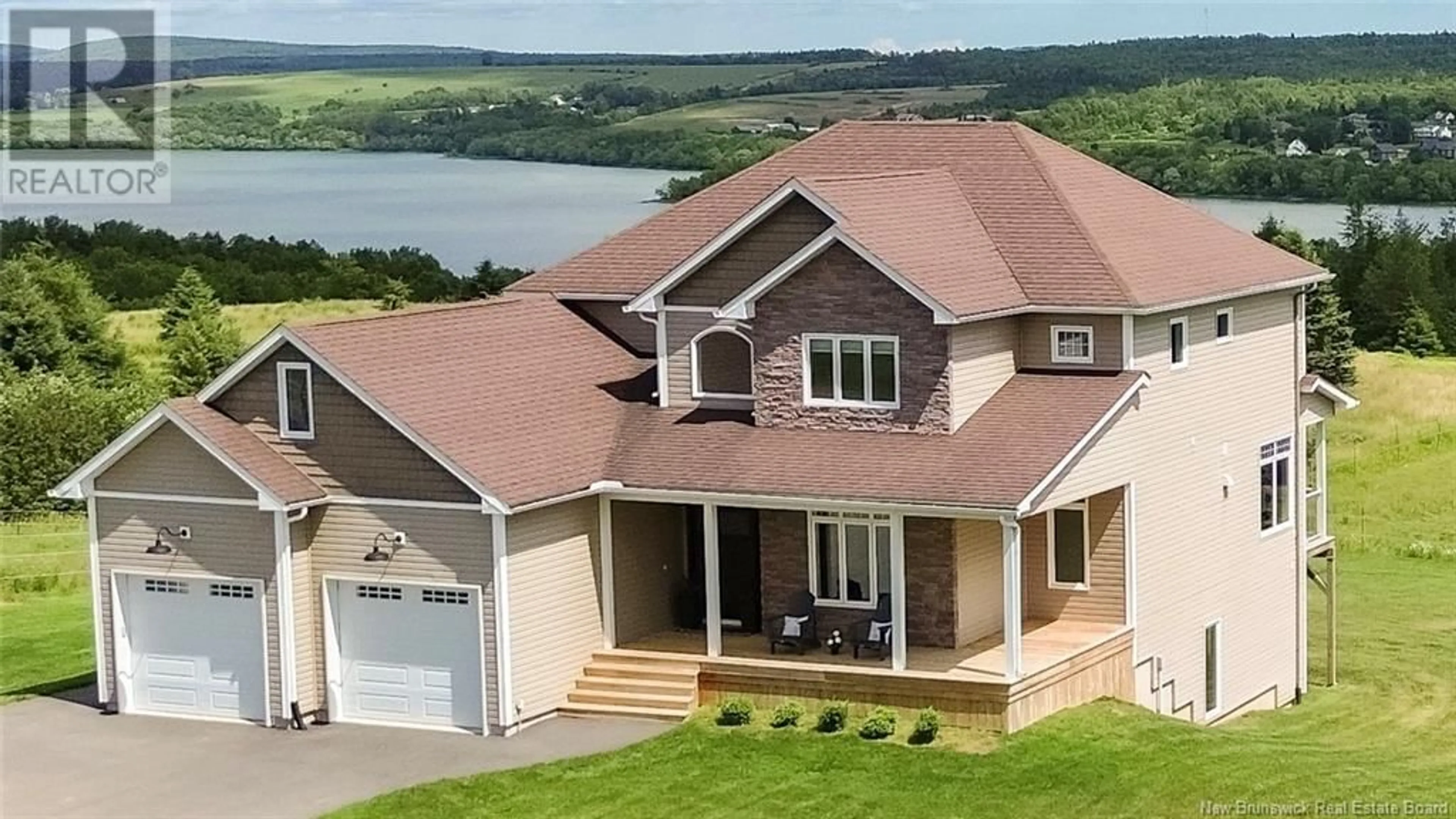 A pic from outside/outdoor area/front of a property/back of a property/a pic from drone, water/lake/river/ocean view for 302 DARLINGS ISLAND ROAD, Darlings Island New Brunswick E5N6S3