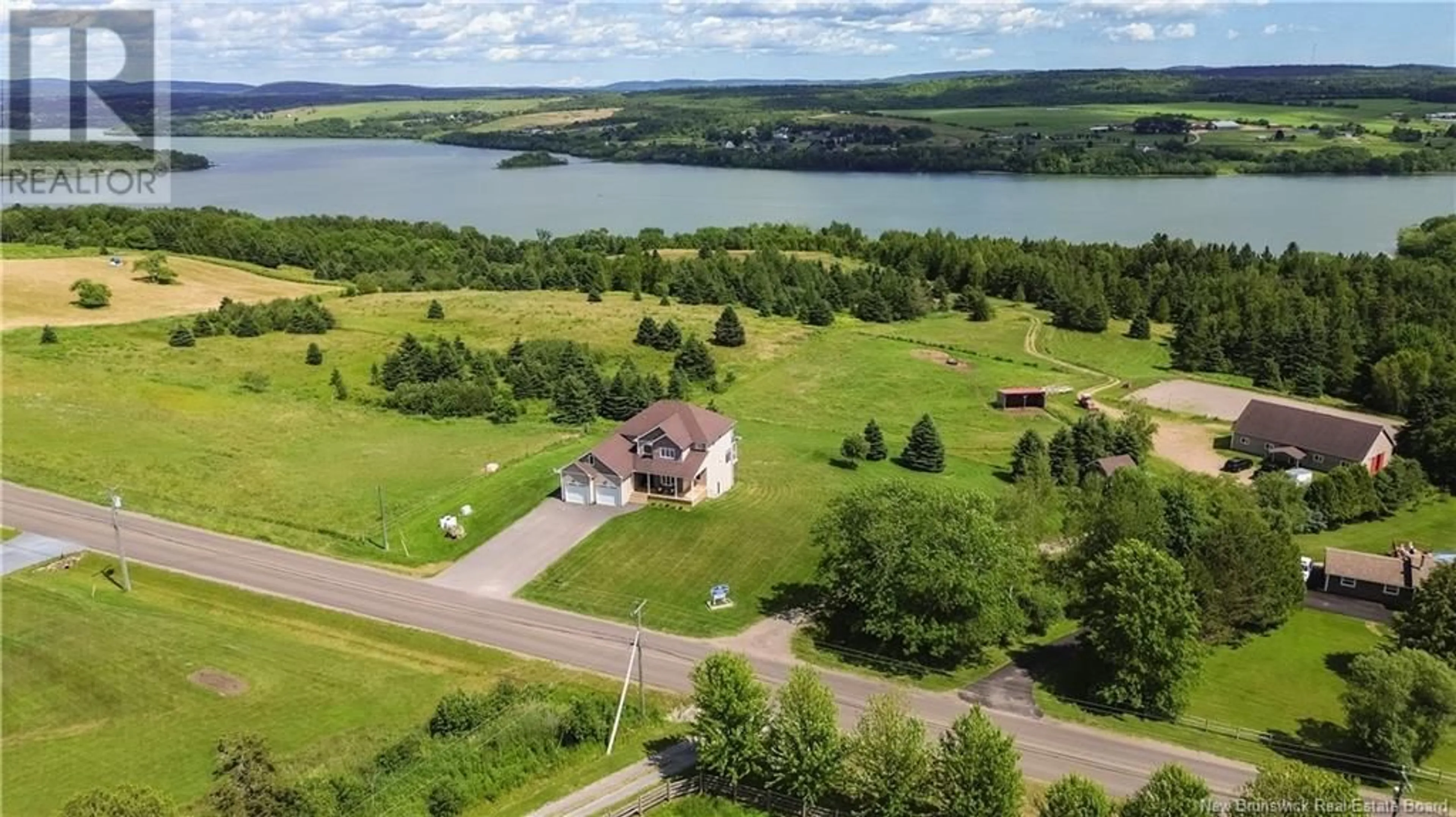A pic from outside/outdoor area/front of a property/back of a property/a pic from drone, water/lake/river/ocean view for 302 DARLINGS ISLAND ROAD, Darlings Island New Brunswick E5N6S3
