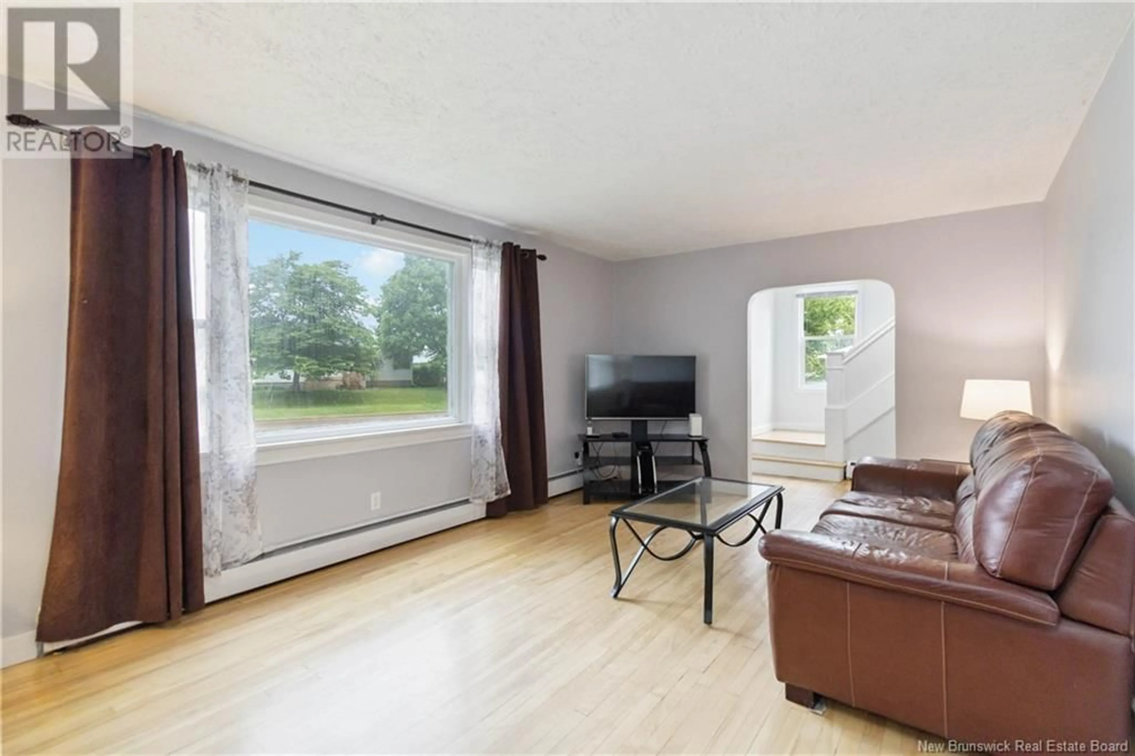 Living room with furniture, unknown for 75 ELLERDALE AVENUE, Moncton New Brunswick E1A3M8