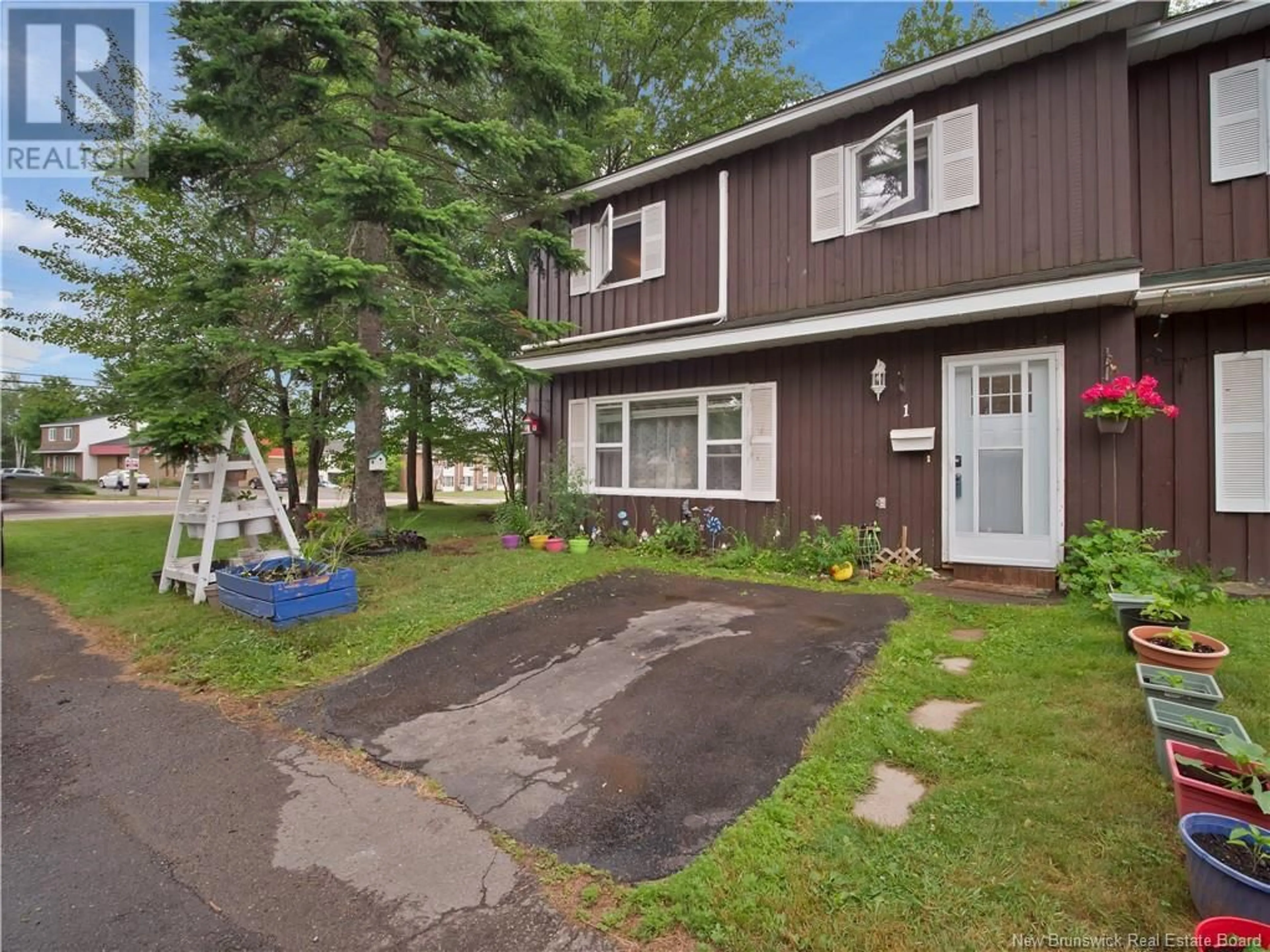 Home with vinyl exterior material, street for 1 - 45 TRITES ROAD, Riverview New Brunswick E1B2V5