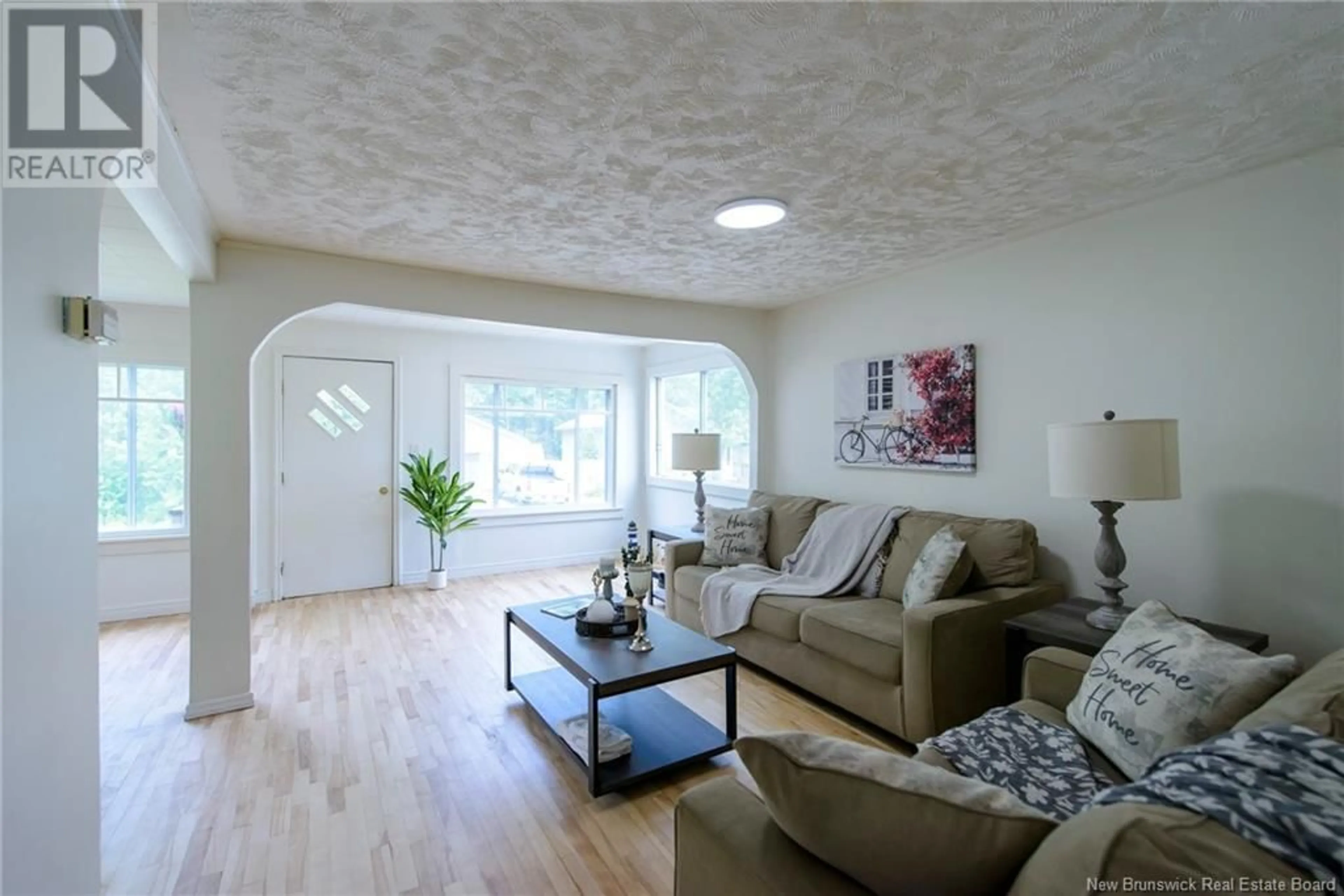 Living room with furniture, wood/laminate floor for 228 HIGHFIELD AVENUE, Saint John New Brunswick E2M6V8