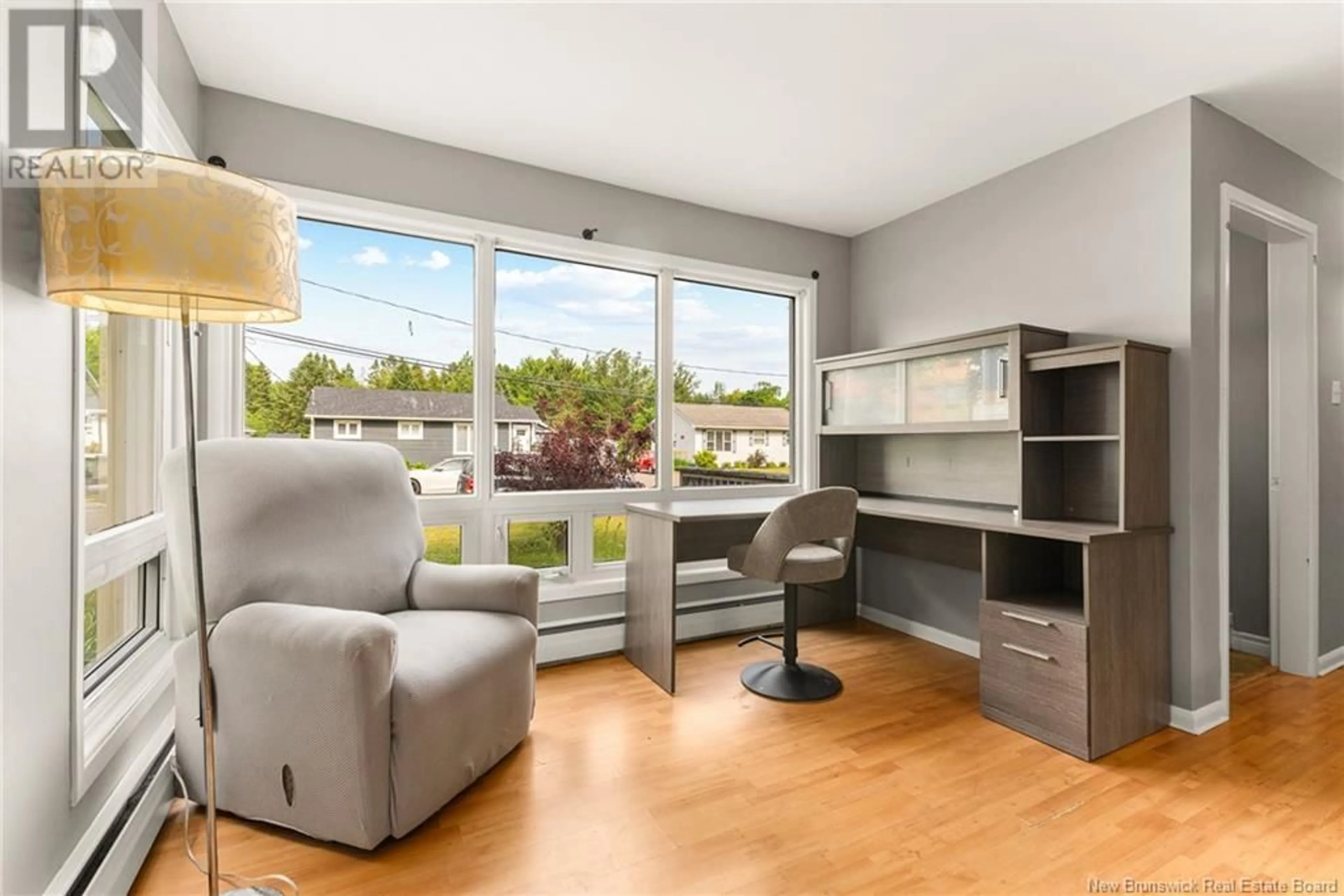 Living room with furniture, wood/laminate floor for 42 MILROTH, Moncton New Brunswick E1A4L1