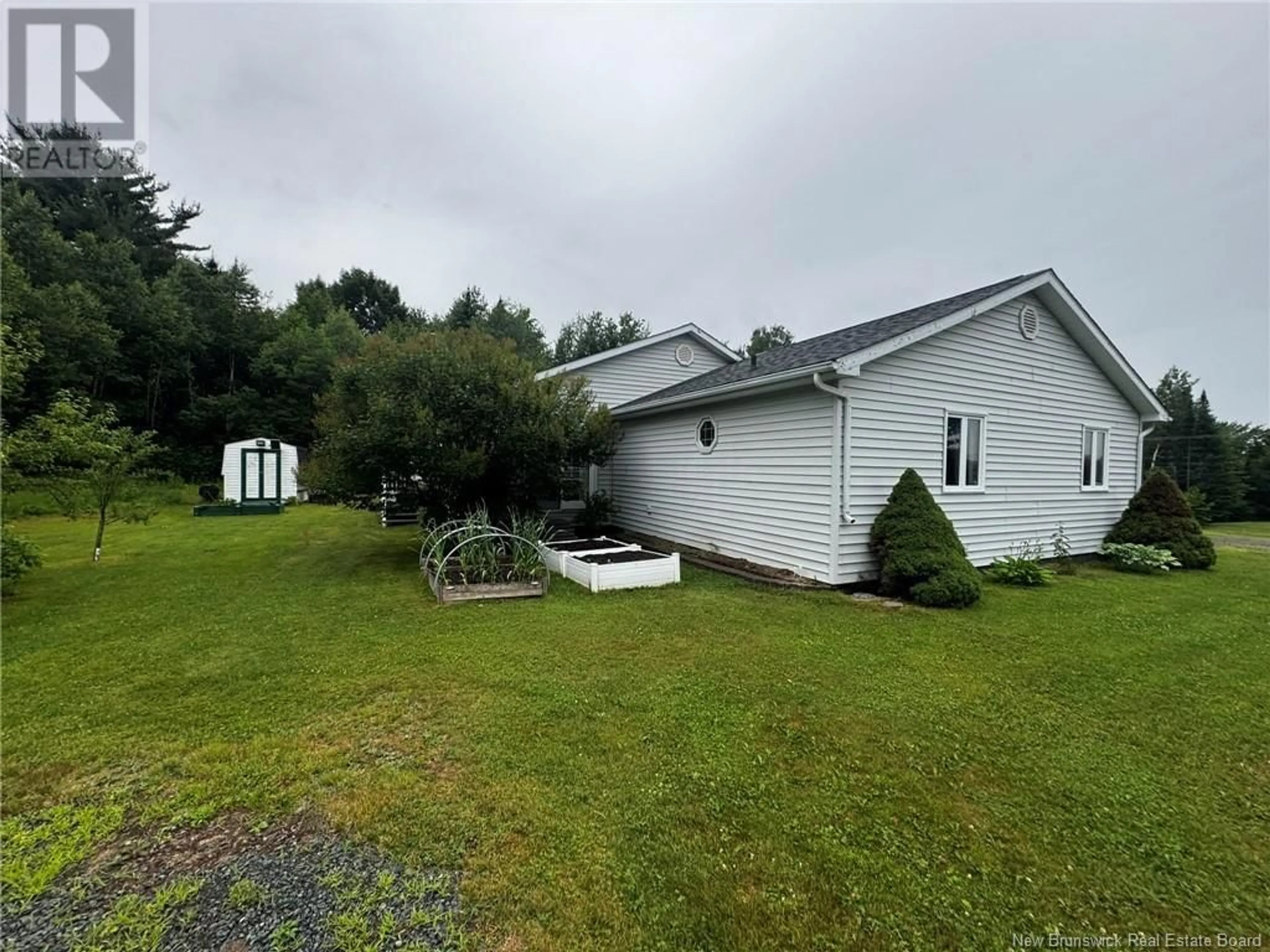 A pic from outside/outdoor area/front of a property/back of a property/a pic from drone, water/lake/river/ocean view for 91 HWY 420, South Esk New Brunswick E1V4P2