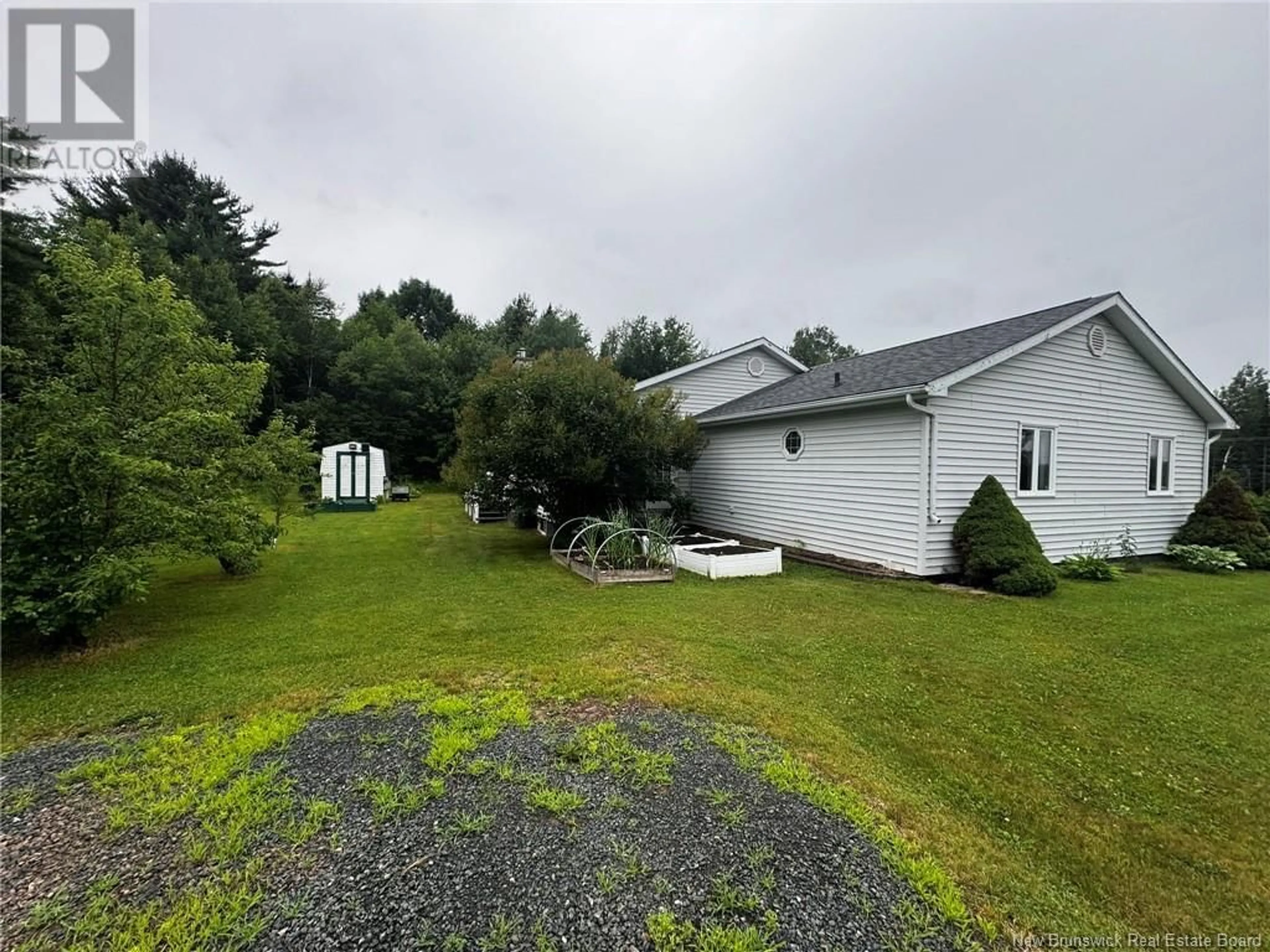 A pic from outside/outdoor area/front of a property/back of a property/a pic from drone, unknown for 91 HWY 420, South Esk New Brunswick E1V4P2