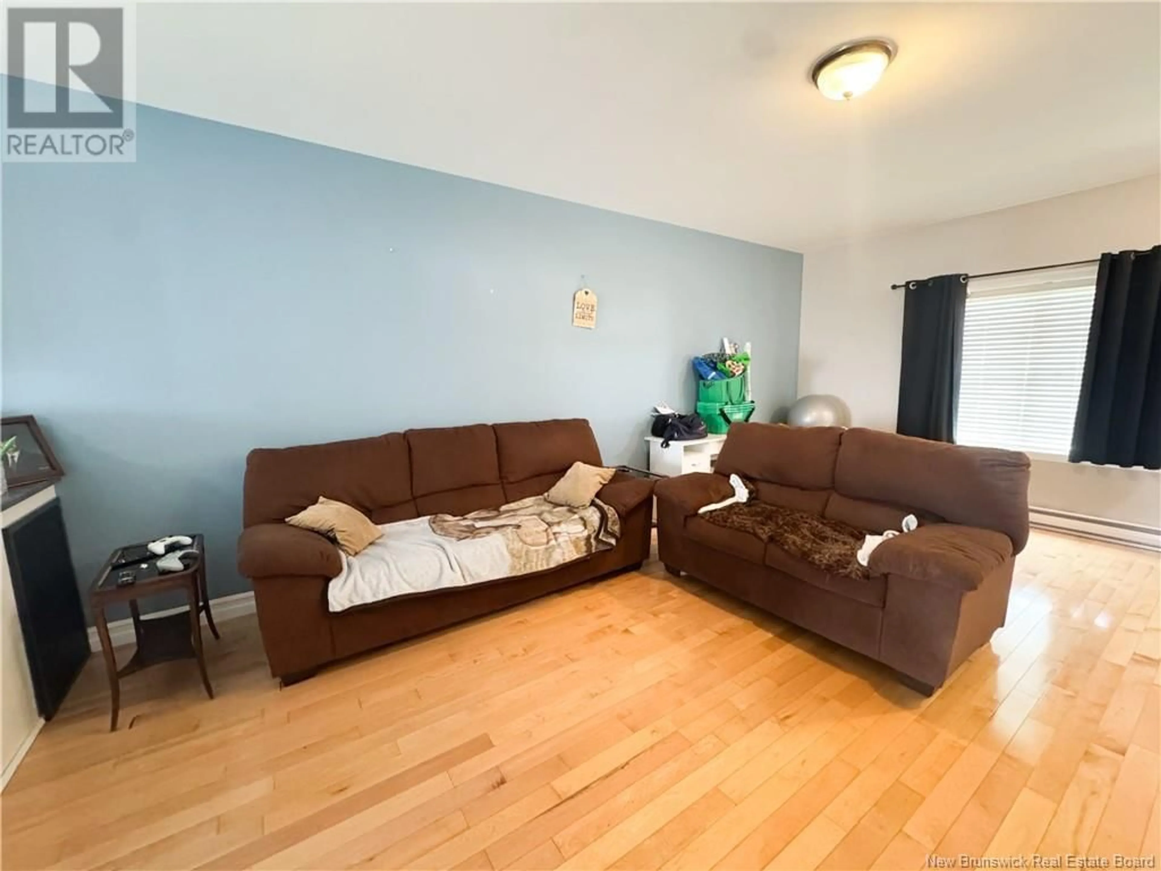 Living room with furniture, unknown for 220 DUKE STREET, Saint John New Brunswick E2M1T7