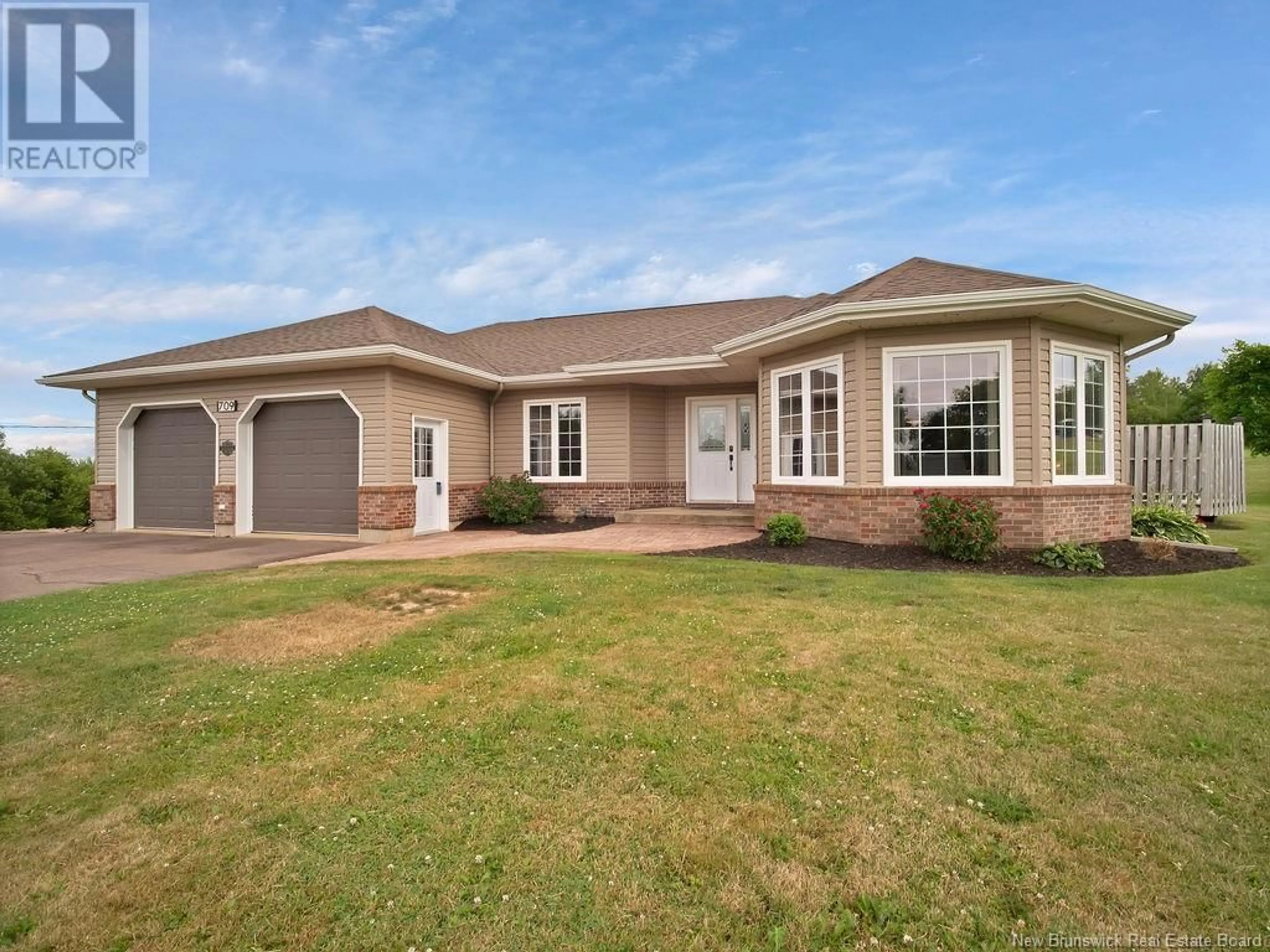 Home with brick exterior material, street for 709 ROUTE 945 ROUTE, Cormier Village New Brunswick E4P4Y3