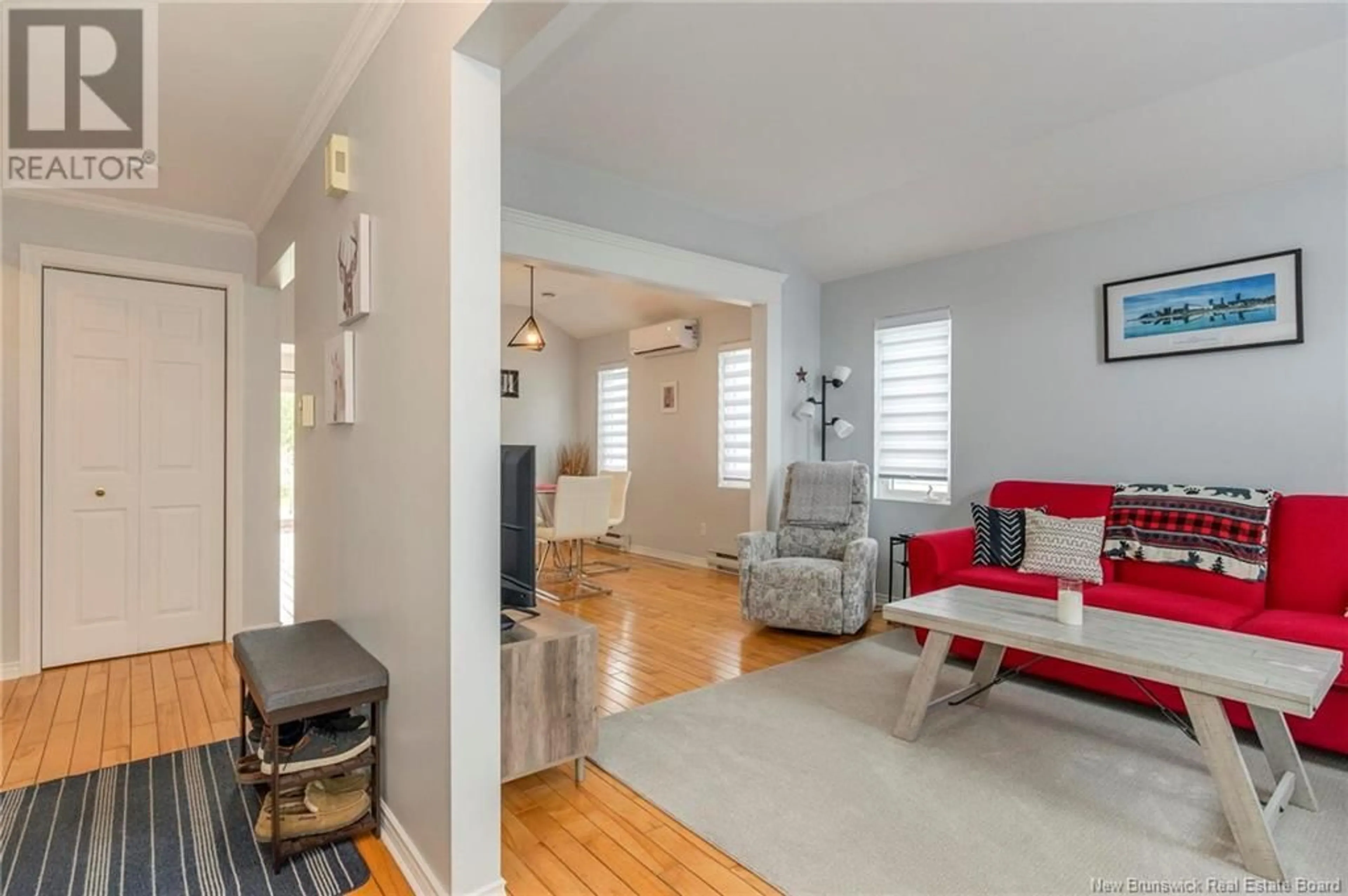 Living room with furniture, wood/laminate floor for 163 - 268 ACADIE AVENUE, Dieppe New Brunswick E1A6T2
