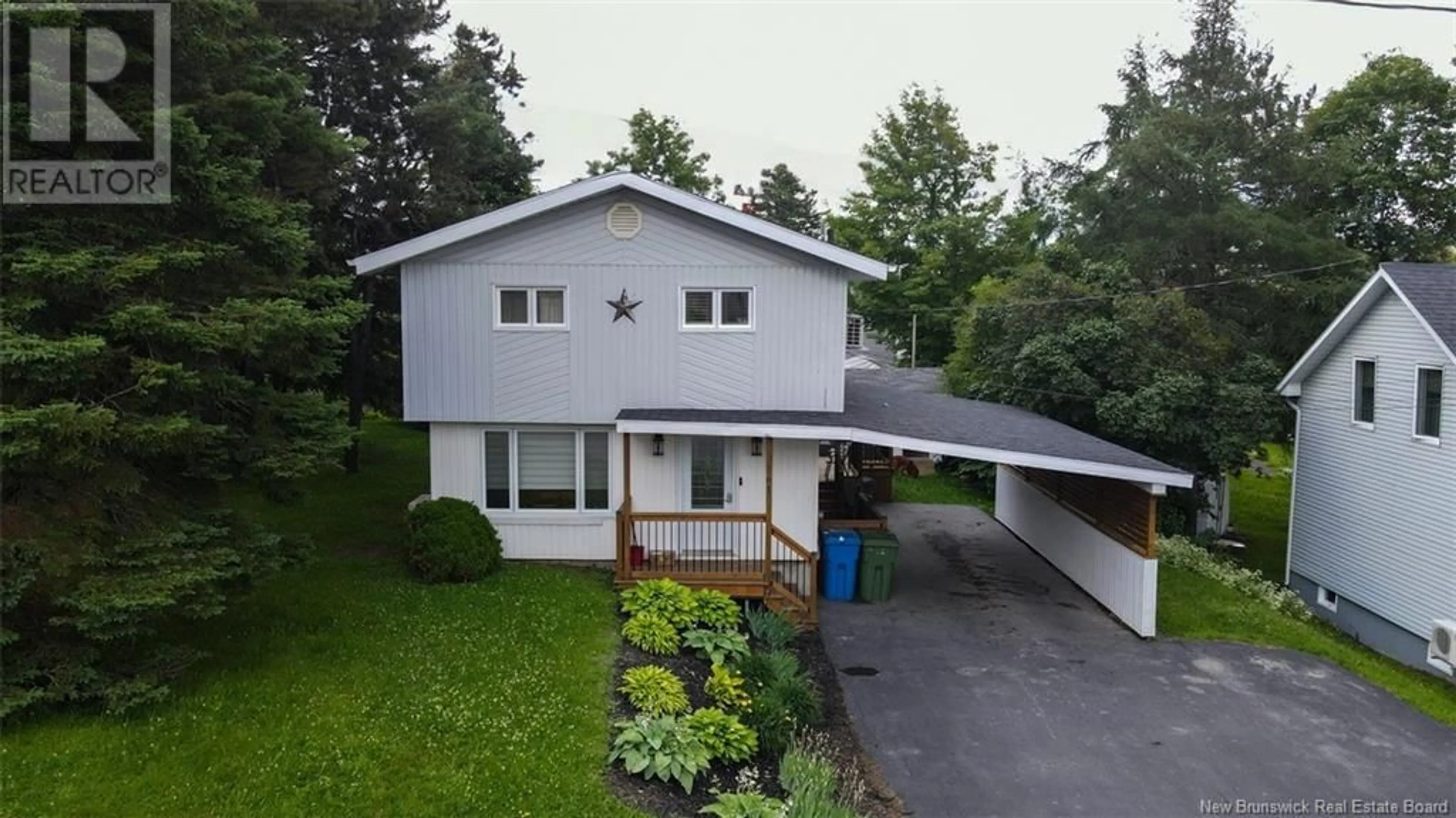A pic from outside/outdoor area/front of a property/back of a property/a pic from drone, street for 161 35TH AVENUE, Edmundston New Brunswick E3V2V5