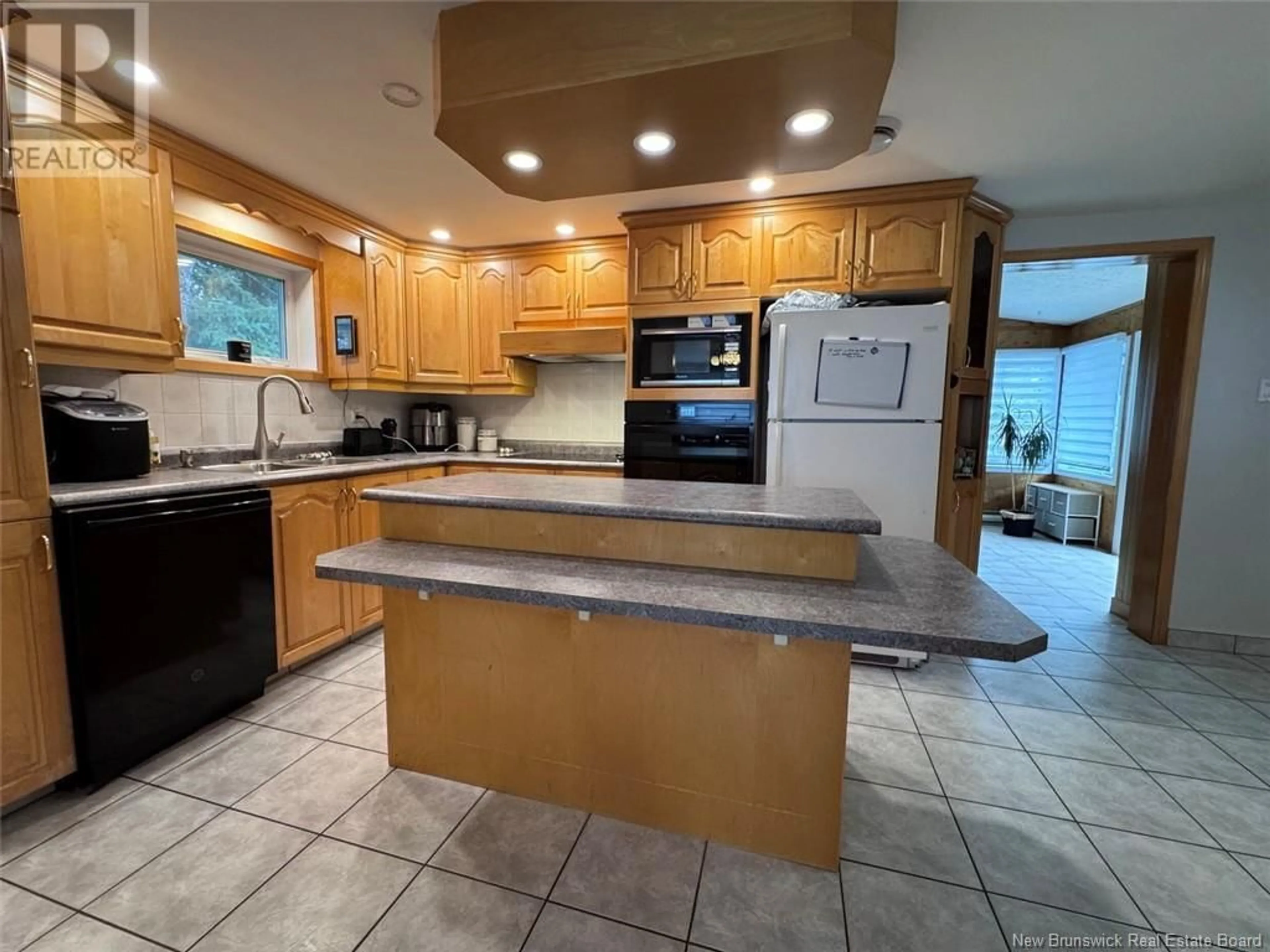 Open concept kitchen, ceramic/tile floor for 161 35TH AVENUE, Edmundston New Brunswick E3V2V5