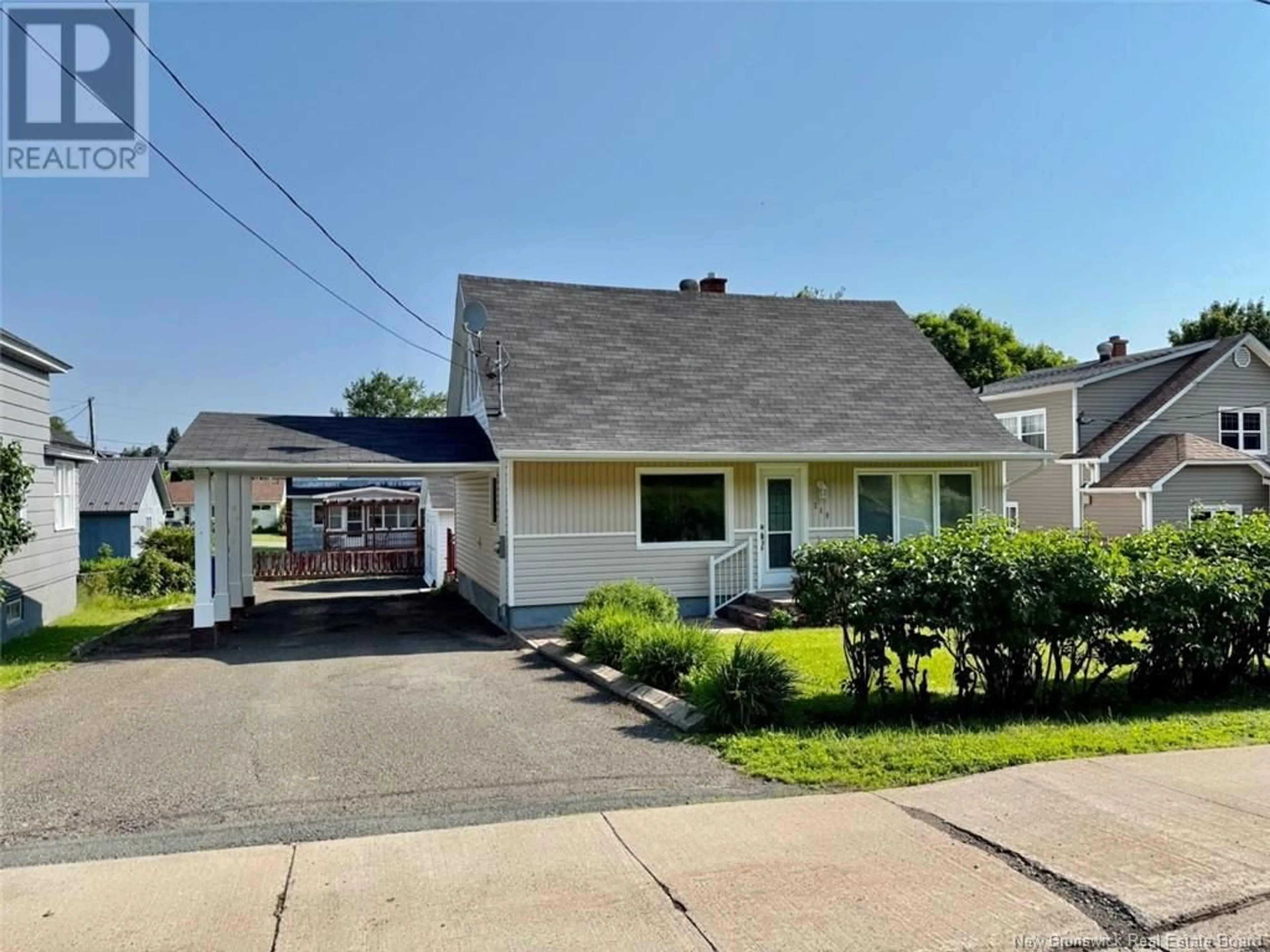 Home with vinyl exterior material, street for 319 GODERICH STREET, Dalhousie New Brunswick E8C1T8