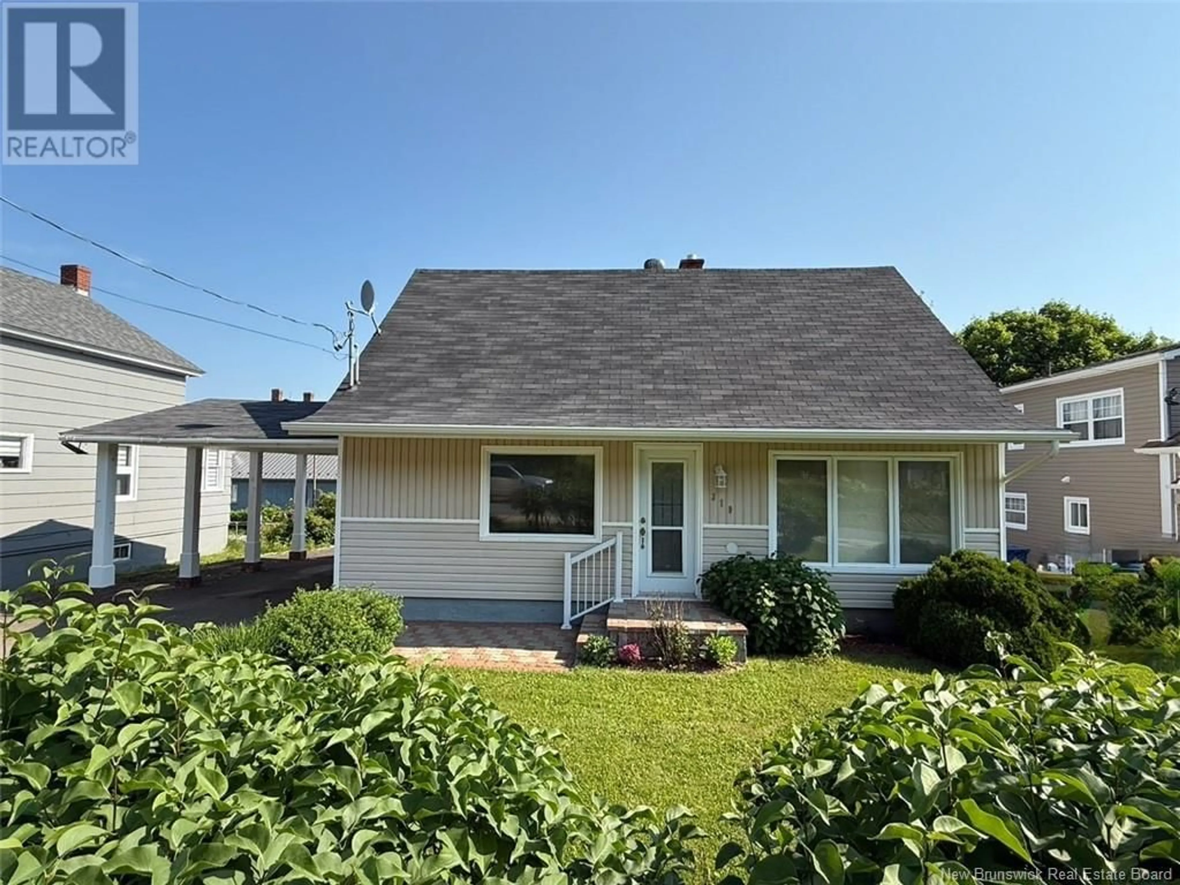 Home with vinyl exterior material, street for 319 GODERICH STREET, Dalhousie New Brunswick E8C1T8