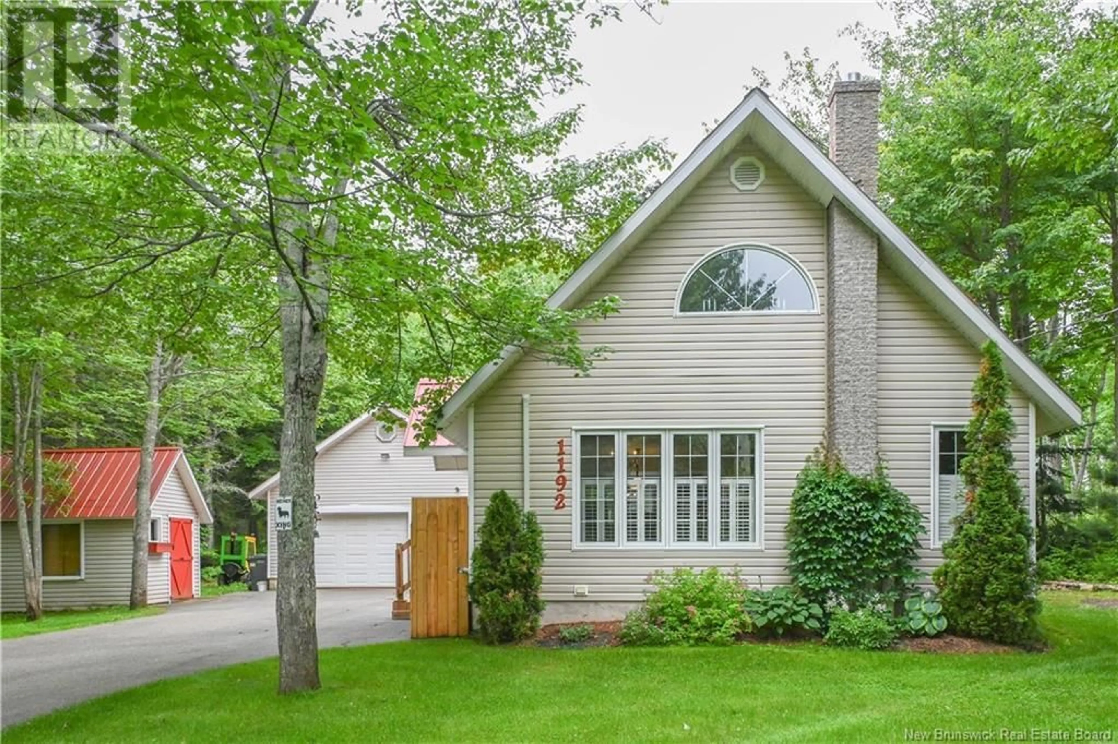Home with vinyl exterior material, street for 1192 THÉRIAULT ROAD, Petit-Paquetville New Brunswick E8R1H2