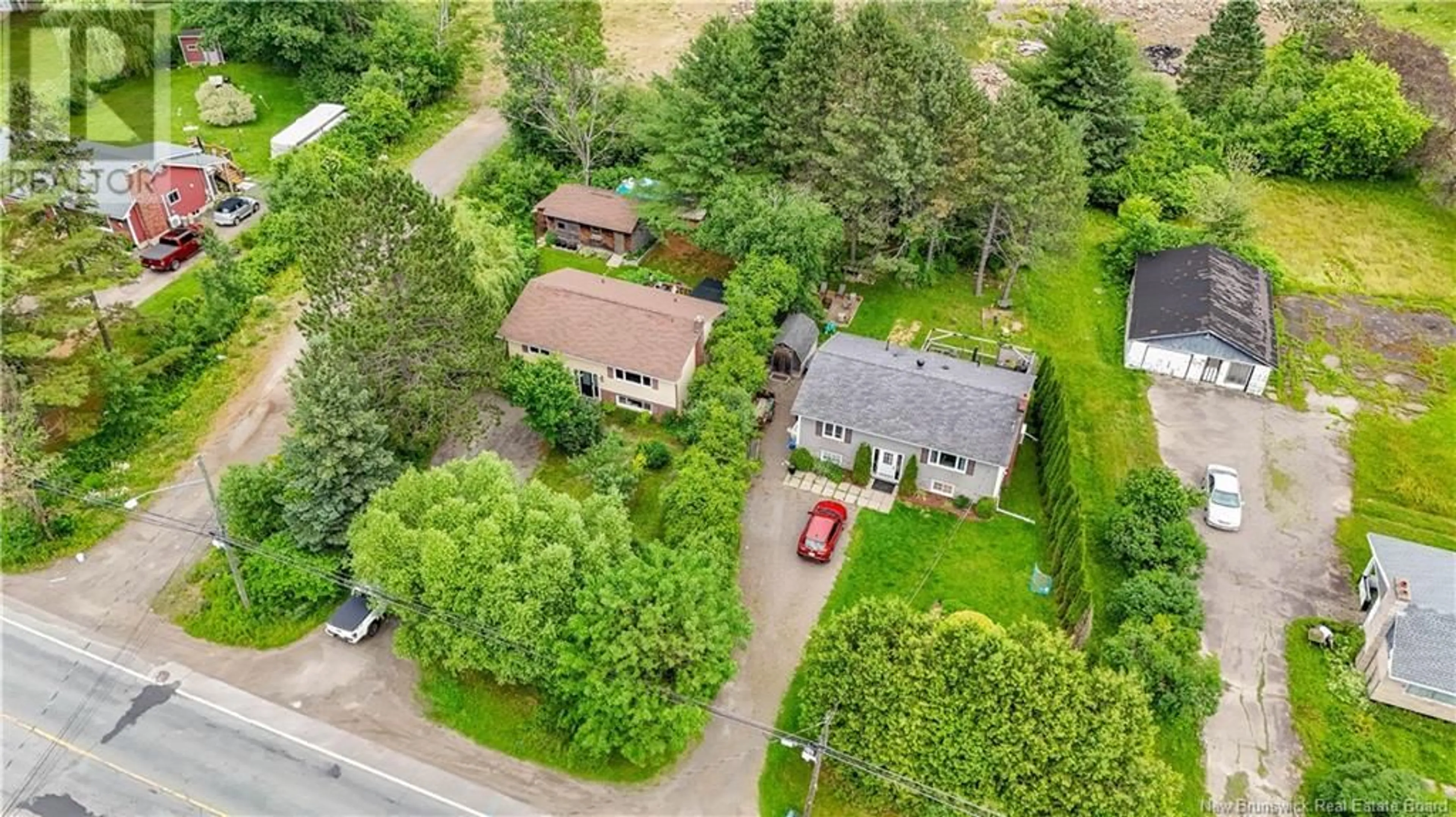 A pic from outside/outdoor area/front of a property/back of a property/a pic from drone, street for 661 RIVERSIDE DRIVE, Fredericton New Brunswick E3A8L2