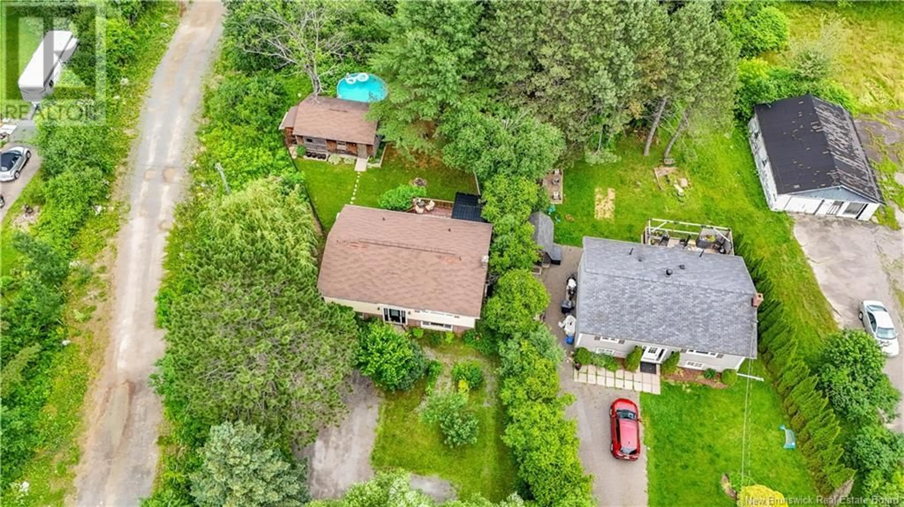 A pic from outside/outdoor area/front of a property/back of a property/a pic from drone, unknown for 661 RIVERSIDE DRIVE, Fredericton New Brunswick E3A8L2