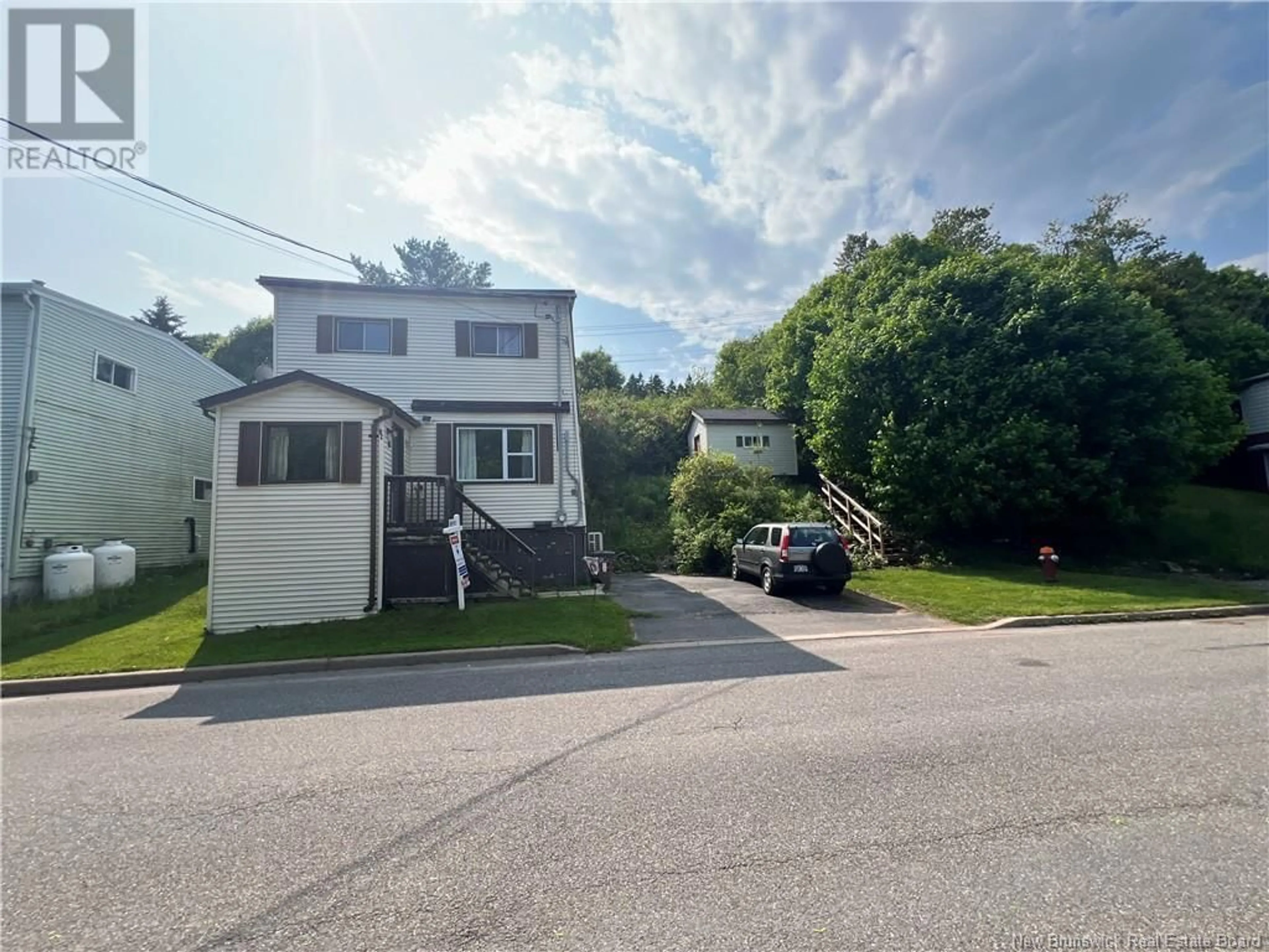 A pic from outside/outdoor area/front of a property/back of a property/a pic from drone, street for 82 SPAR COVE ROAD, Saint John New Brunswick E2K1S1
