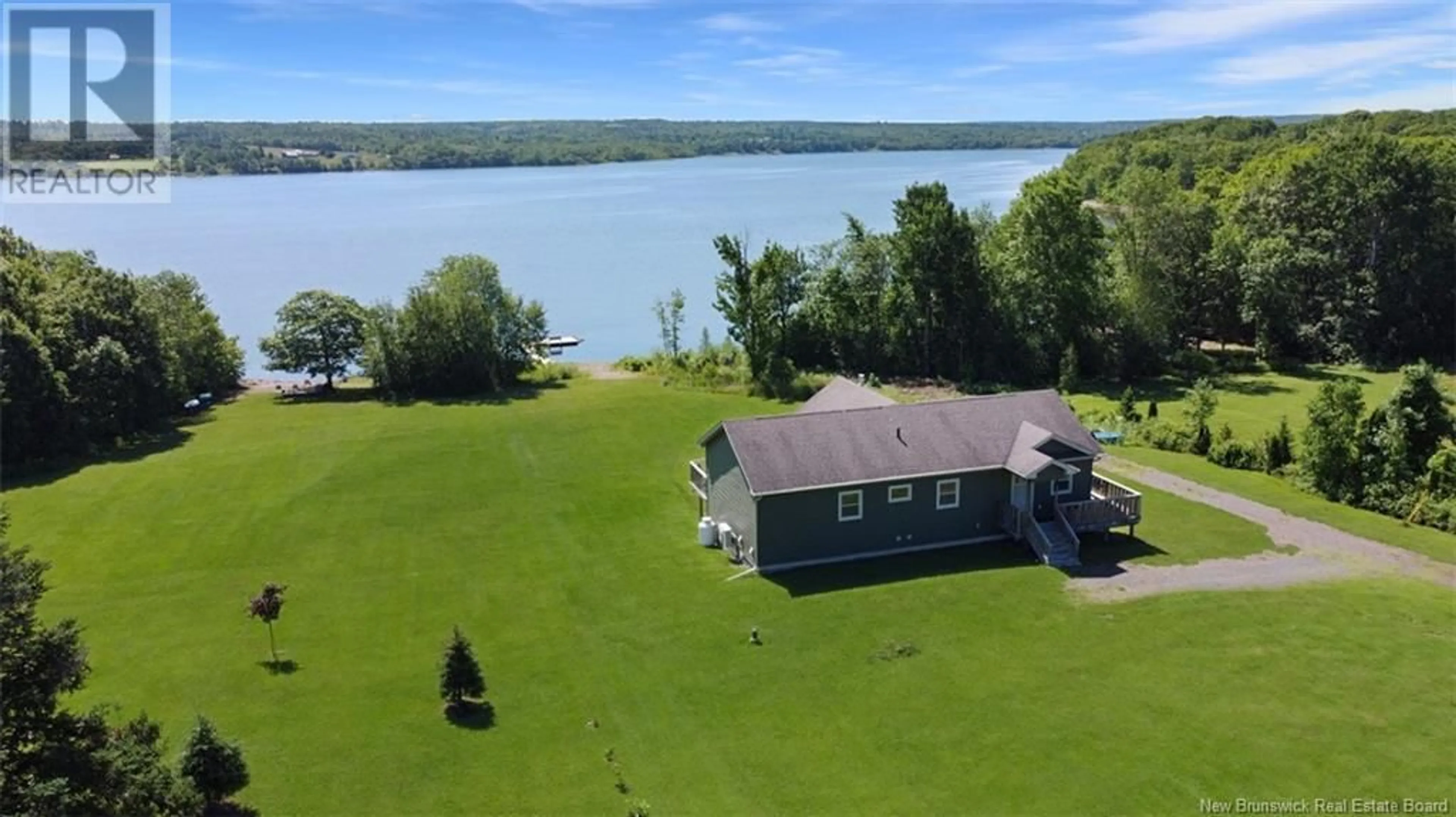 A pic from outside/outdoor area/front of a property/back of a property/a pic from drone, water/lake/river/ocean view for 2005 LAKEVIEW ROAD, Cambridge-Narrows New Brunswick E4C1N3
