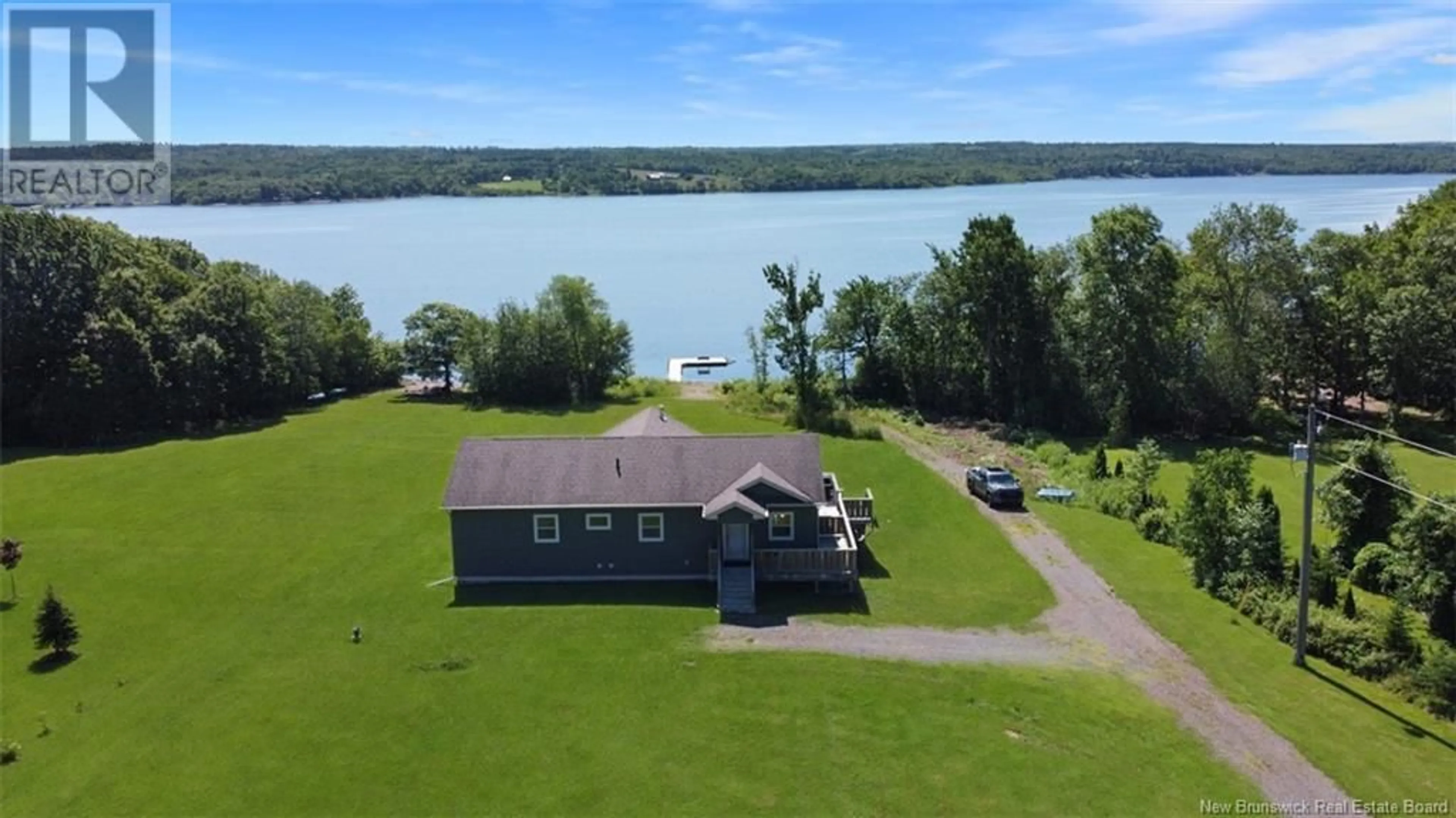 A pic from outside/outdoor area/front of a property/back of a property/a pic from drone, water/lake/river/ocean view for 2005 LAKEVIEW ROAD, Cambridge-Narrows New Brunswick E4C1N3