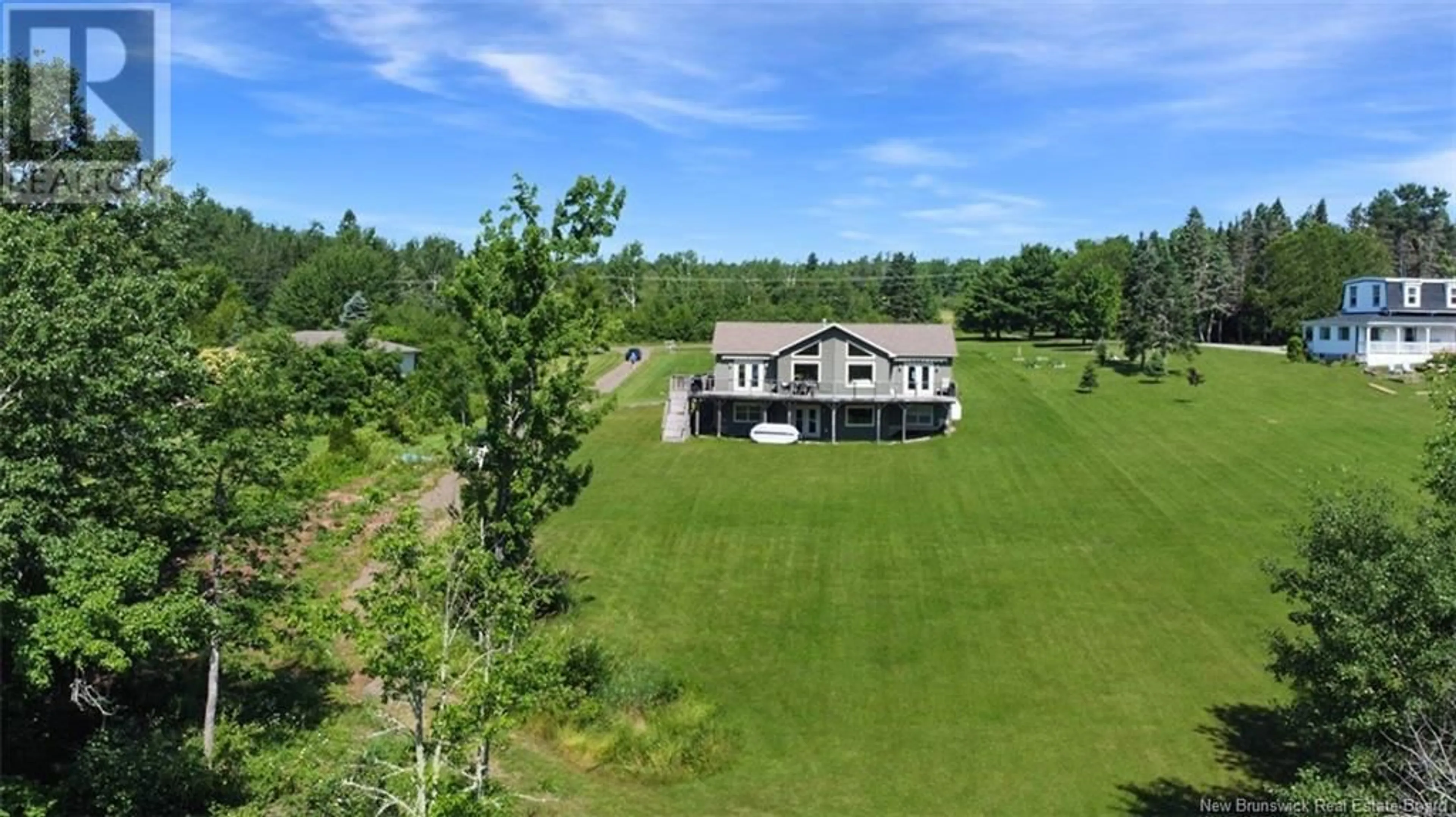 A pic from outside/outdoor area/front of a property/back of a property/a pic from drone, water/lake/river/ocean view for 2005 LAKEVIEW ROAD, Cambridge-Narrows New Brunswick E4C1N3