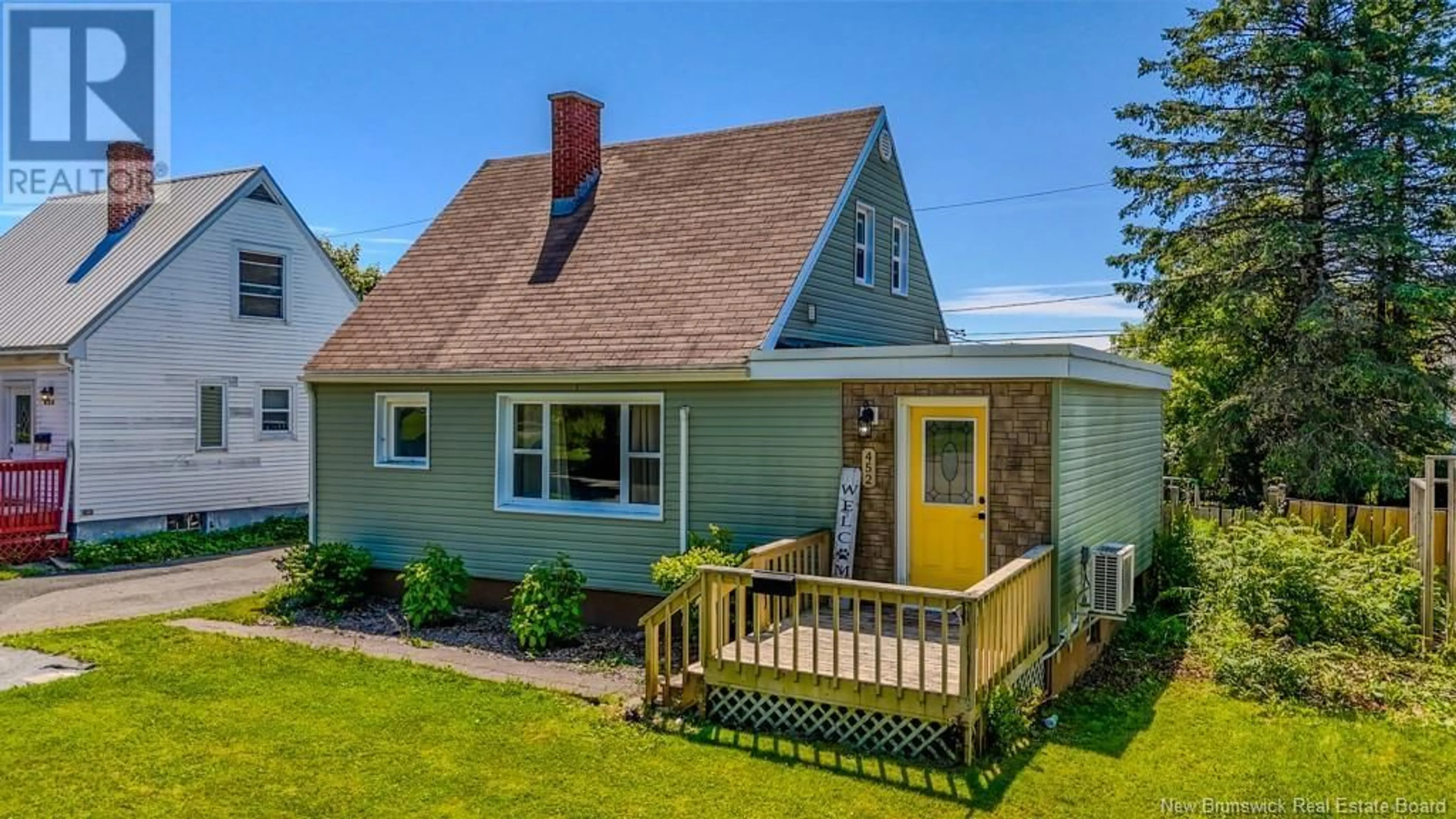 Home with vinyl exterior material, street for 452 FUNDY DRIVE, Saint John New Brunswick E2M2R7