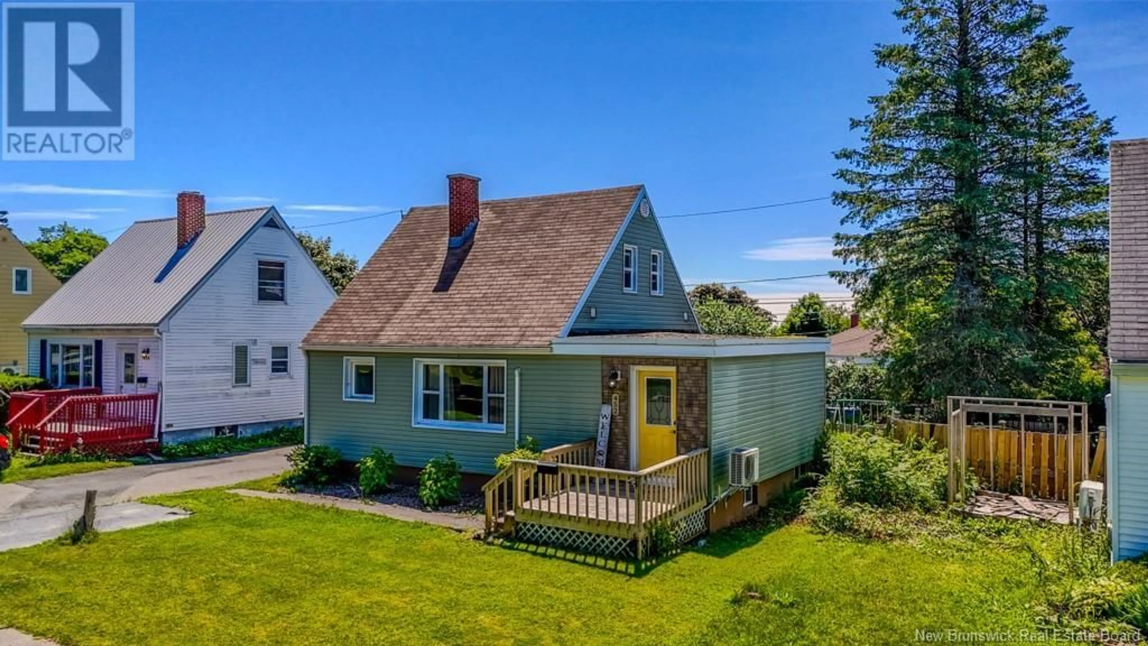 A pic from outside/outdoor area/front of a property/back of a property/a pic from drone, street for 452 FUNDY DRIVE, Saint John New Brunswick E2M2R7