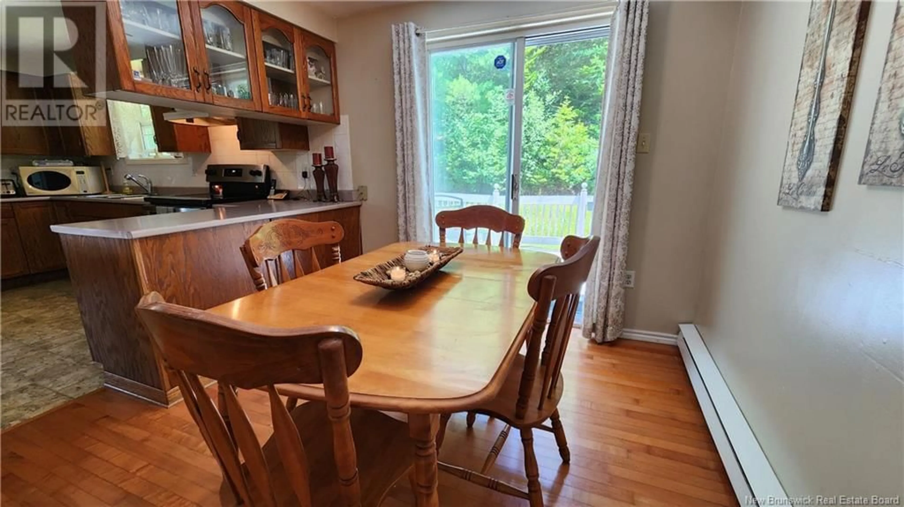 Dining room, wood/laminate floor for 10 MEADOW BROOK DRIVE, Grand Bay-Westfield New Brunswick E5K2S8