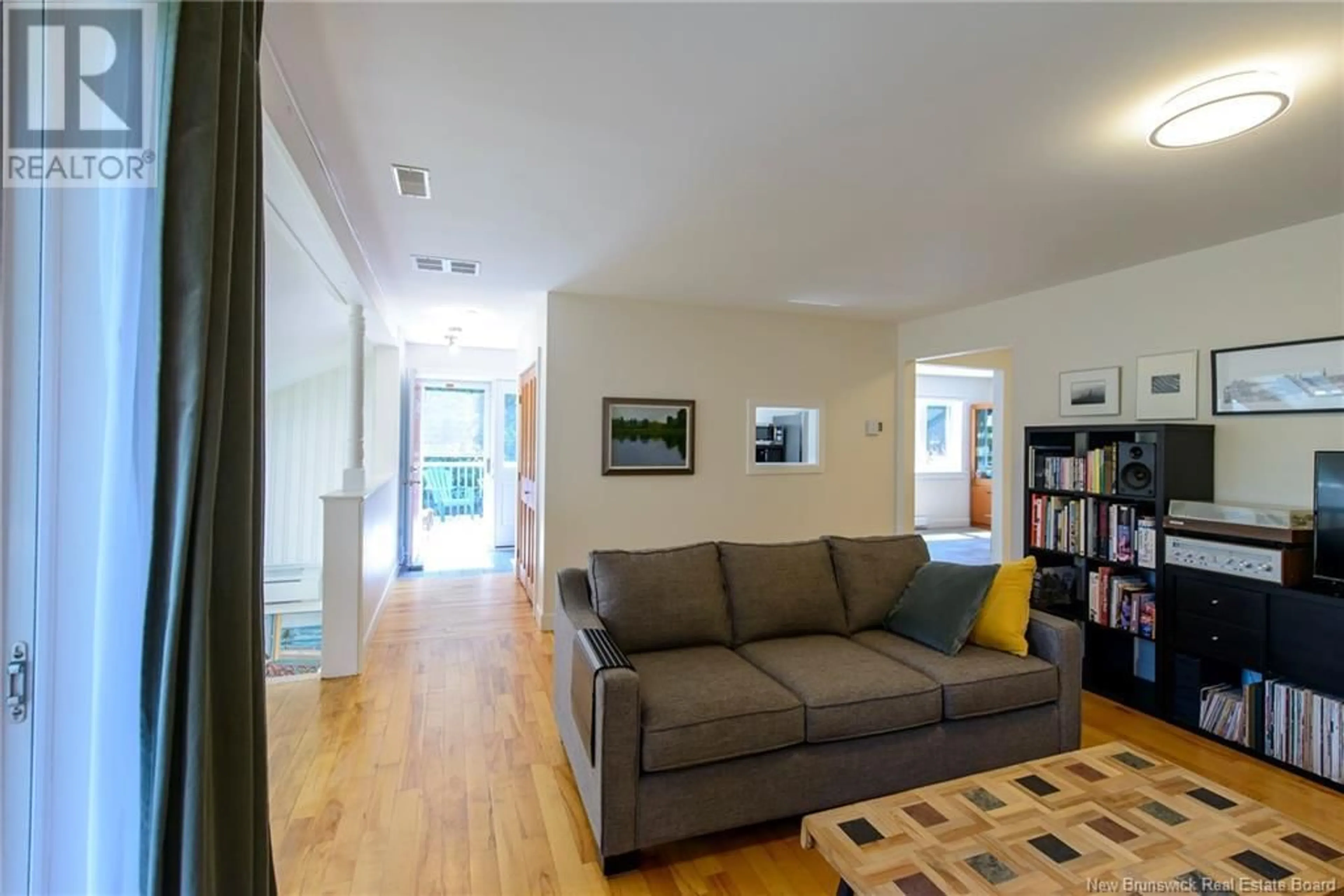 Living room with furniture, unknown for 11 BELL AVENUE, Darlings Island New Brunswick E5N6R5