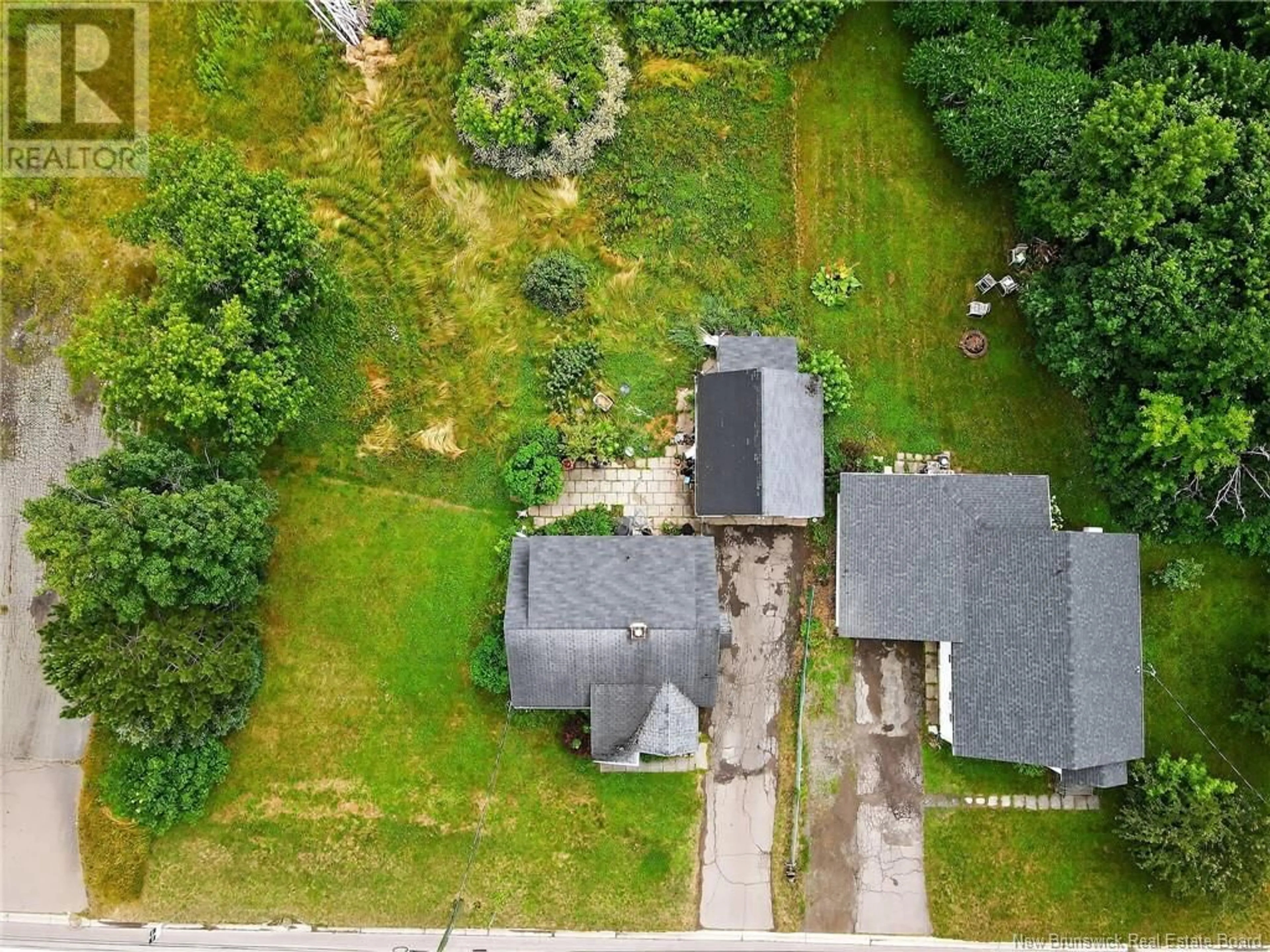 A pic from outside/outdoor area/front of a property/back of a property/a pic from drone, street for 300 SALISBURY ROAD, Moncton New Brunswick E1E1A7