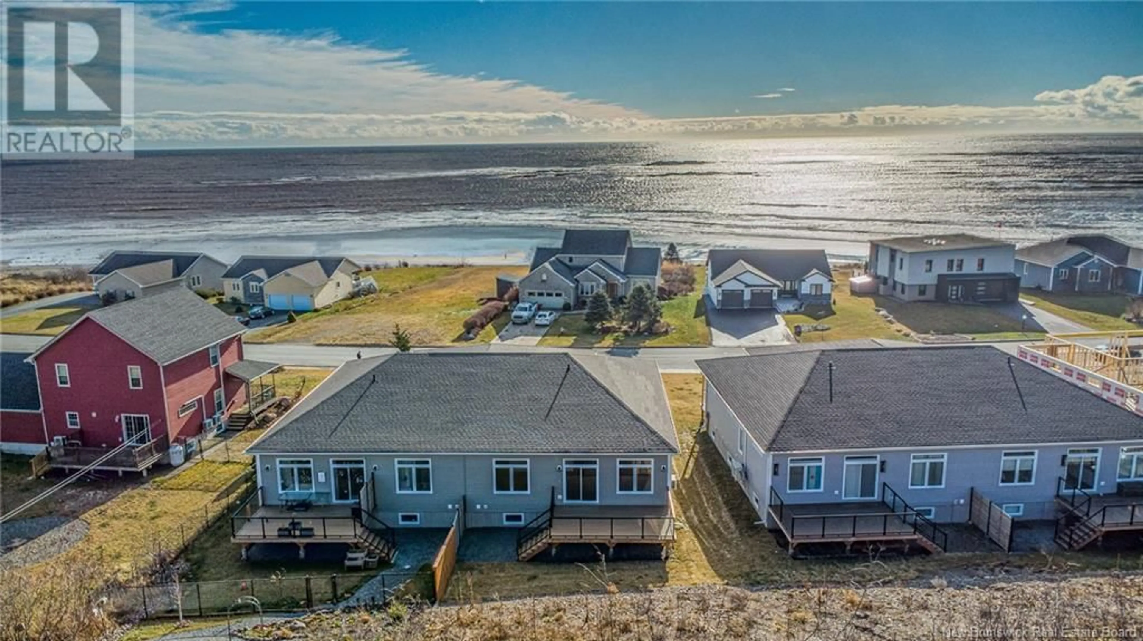 A pic from outside/outdoor area/front of a property/back of a property/a pic from drone, water/lake/river/ocean view for 630 SEA STREET, Saint John New Brunswick E2M2N4