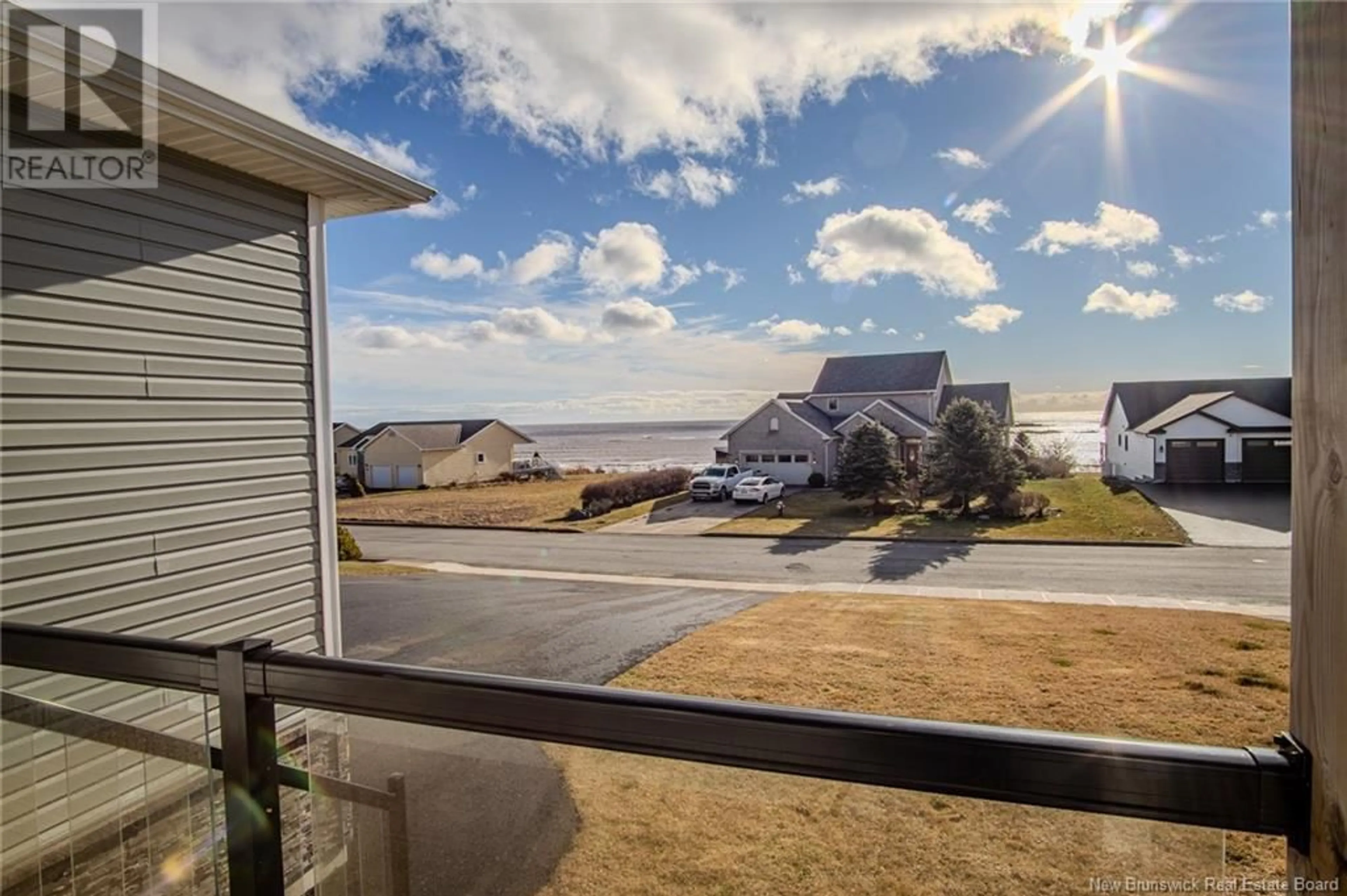 A pic from outside/outdoor area/front of a property/back of a property/a pic from drone, water/lake/river/ocean view for 630 SEA STREET, Saint John New Brunswick E2M2N4