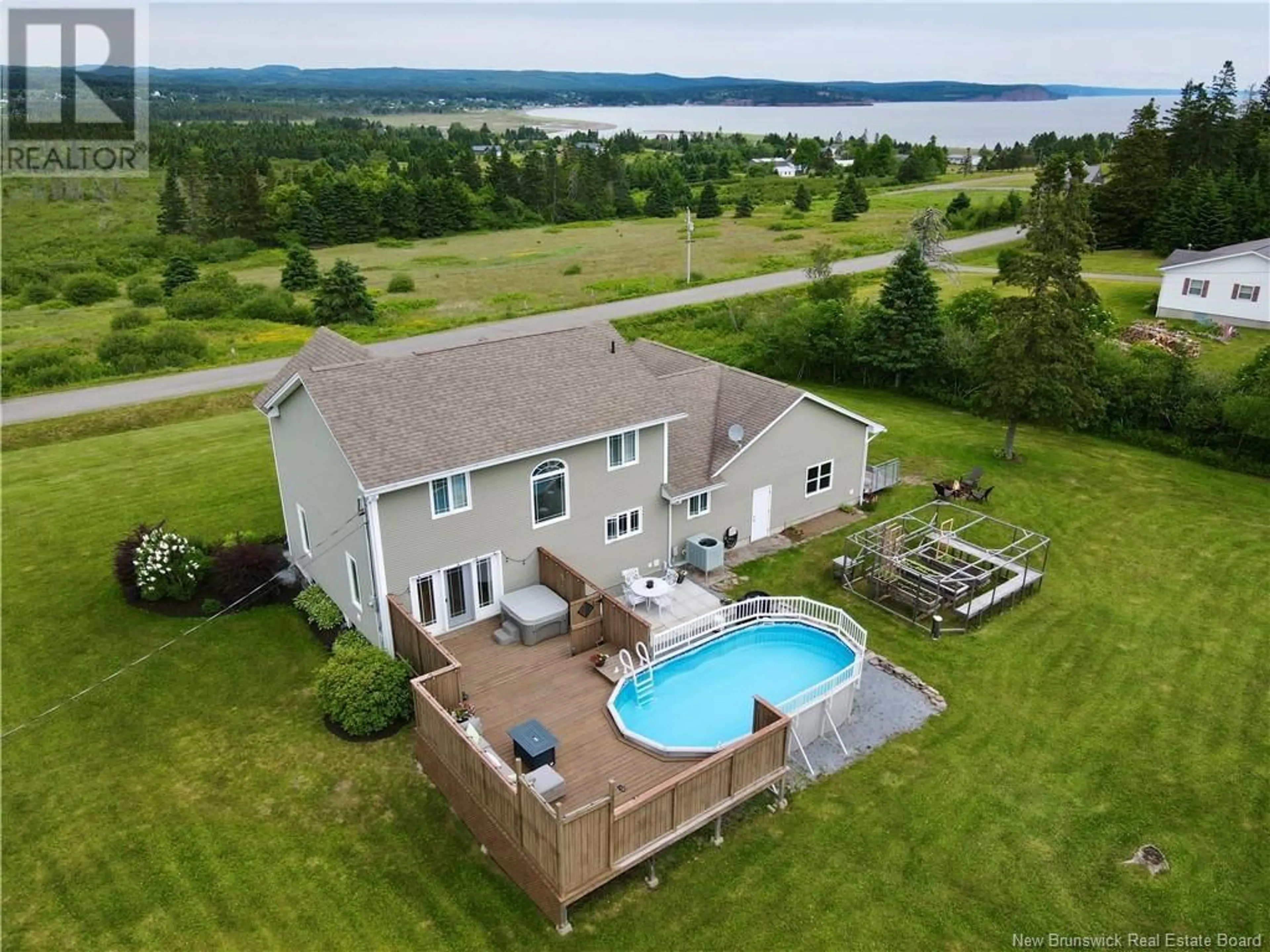A pic from outside/outdoor area/front of a property/back of a property/a pic from drone, water/lake/river/ocean view for 27 DAVID FARM ROAD, West Quaco New Brunswick E5R2G5