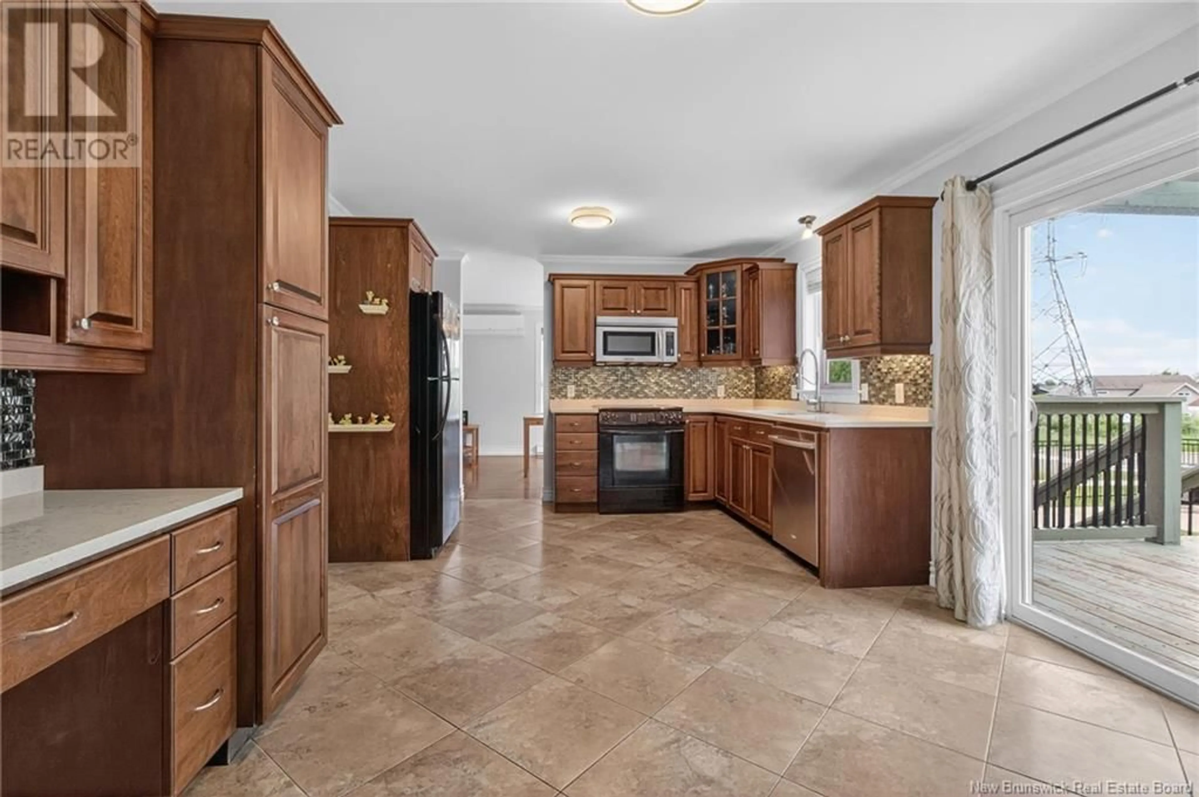 Open concept kitchen, ceramic/tile floor for 2 FOREST GROVE, Moncton New Brunswick E1G5K5