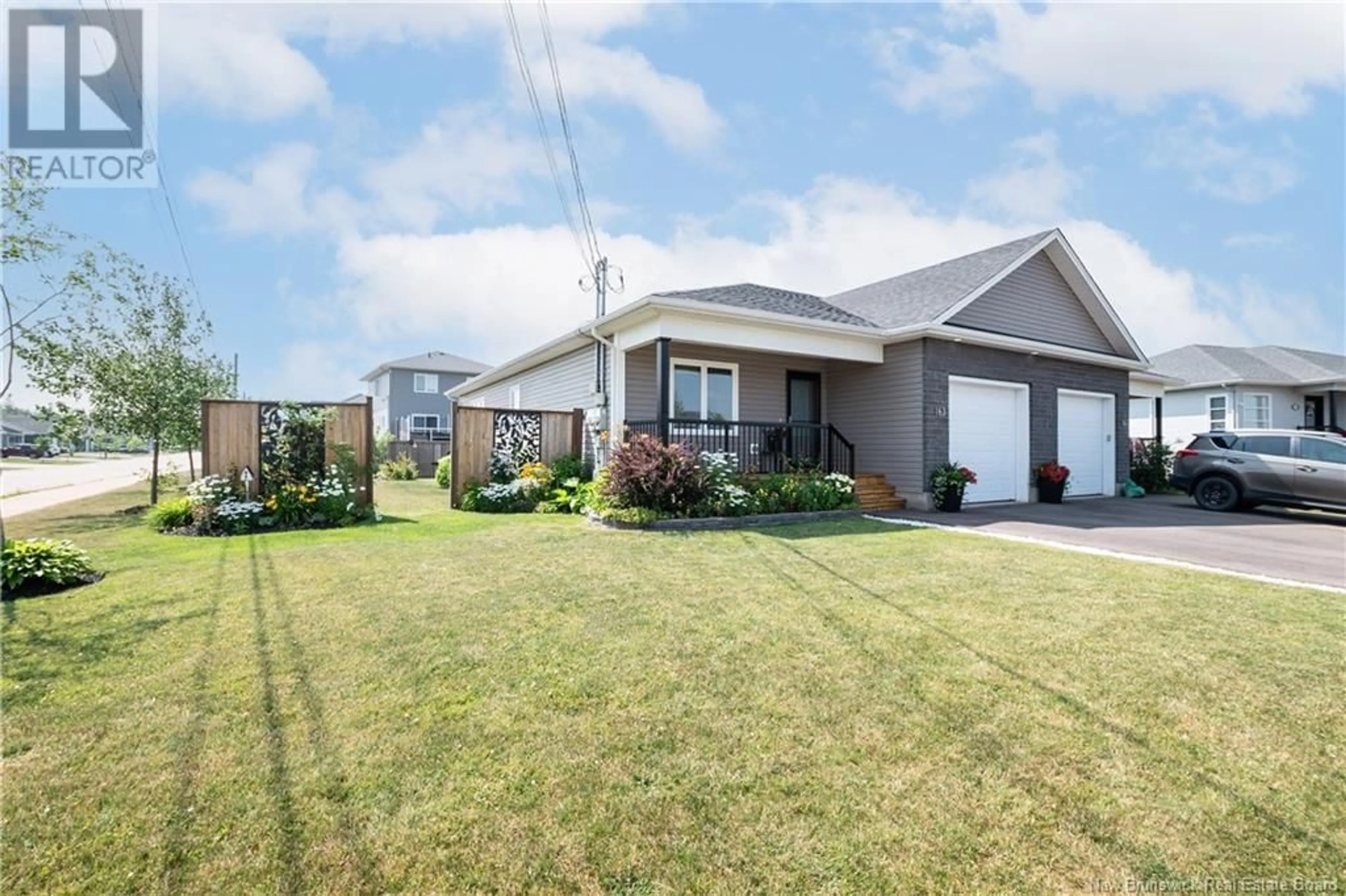 Home with vinyl exterior material, street for 163 FALCON DRIVE, Moncton New Brunswick E1G0H8