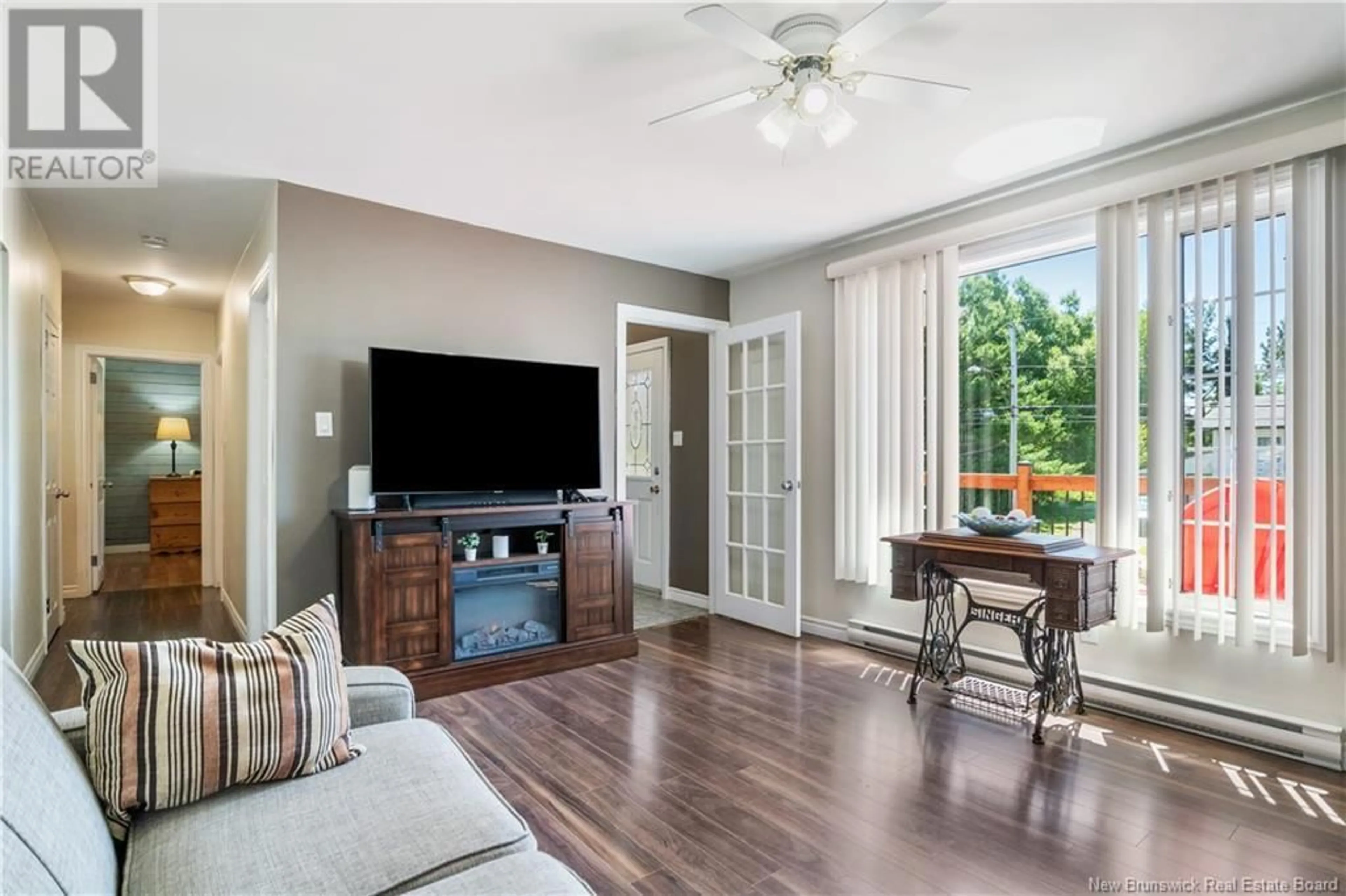Living room with furniture, wood/laminate floor for 15 HIGHLAND VIEW, Moncton New Brunswick E1A2K9