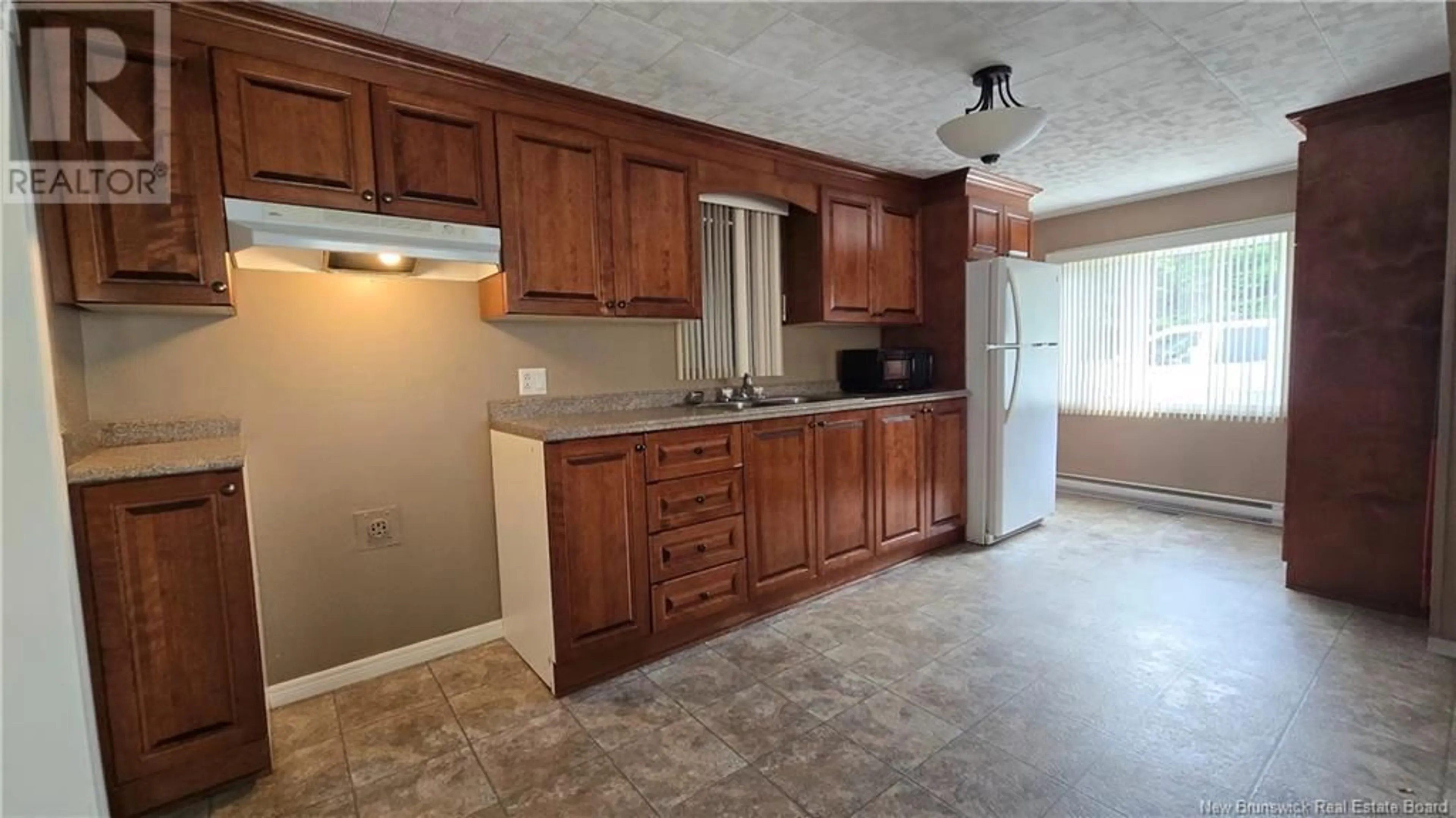 Standard kitchen, ceramic/tile floor for 26 SUNSET DRIVE, Campbellton New Brunswick E3N1S8