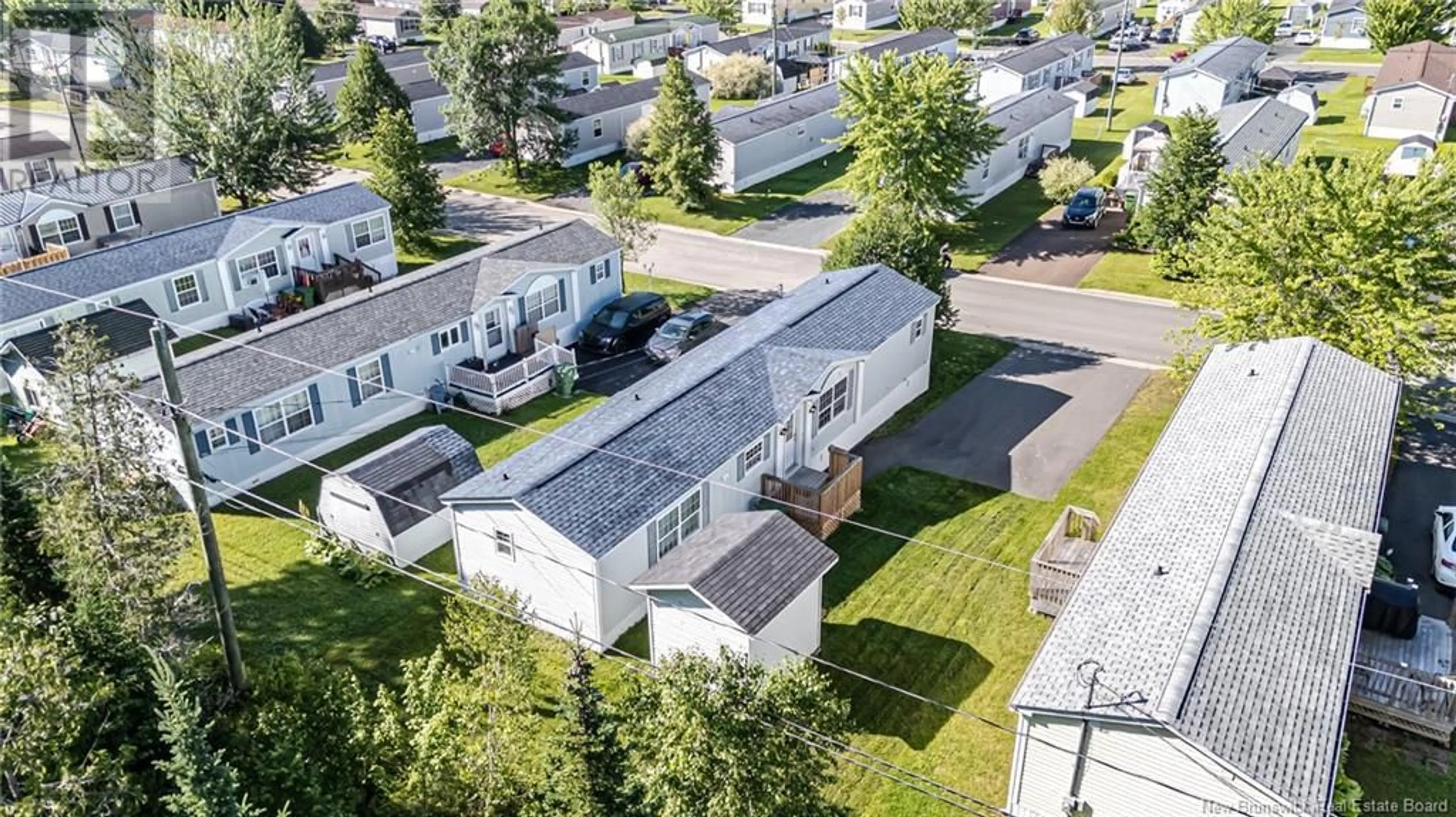 A pic from outside/outdoor area/front of a property/back of a property/a pic from drone, street for 101 GLENMAR DRIVE, Fredericton New Brunswick E3G0S3