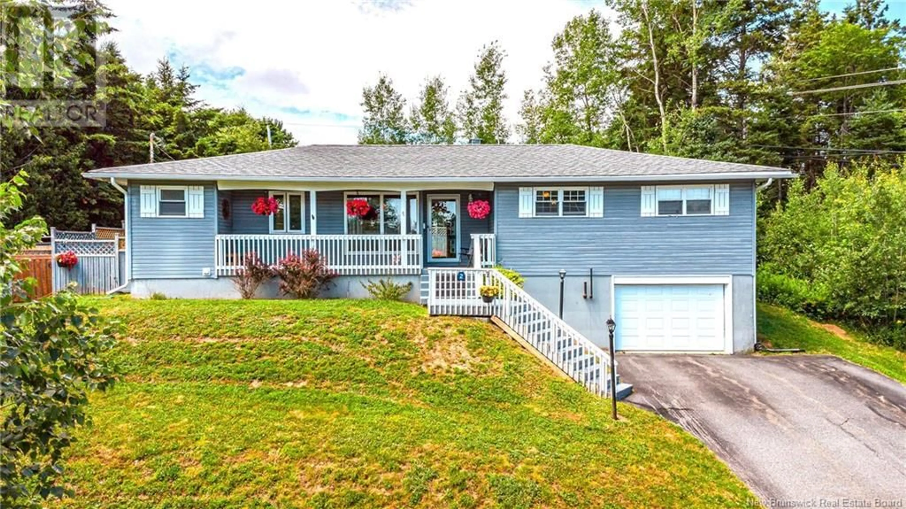 Home with vinyl exterior material, street for 2 COLONIAL DRIVE, Quispamsis New Brunswick E2G1A6