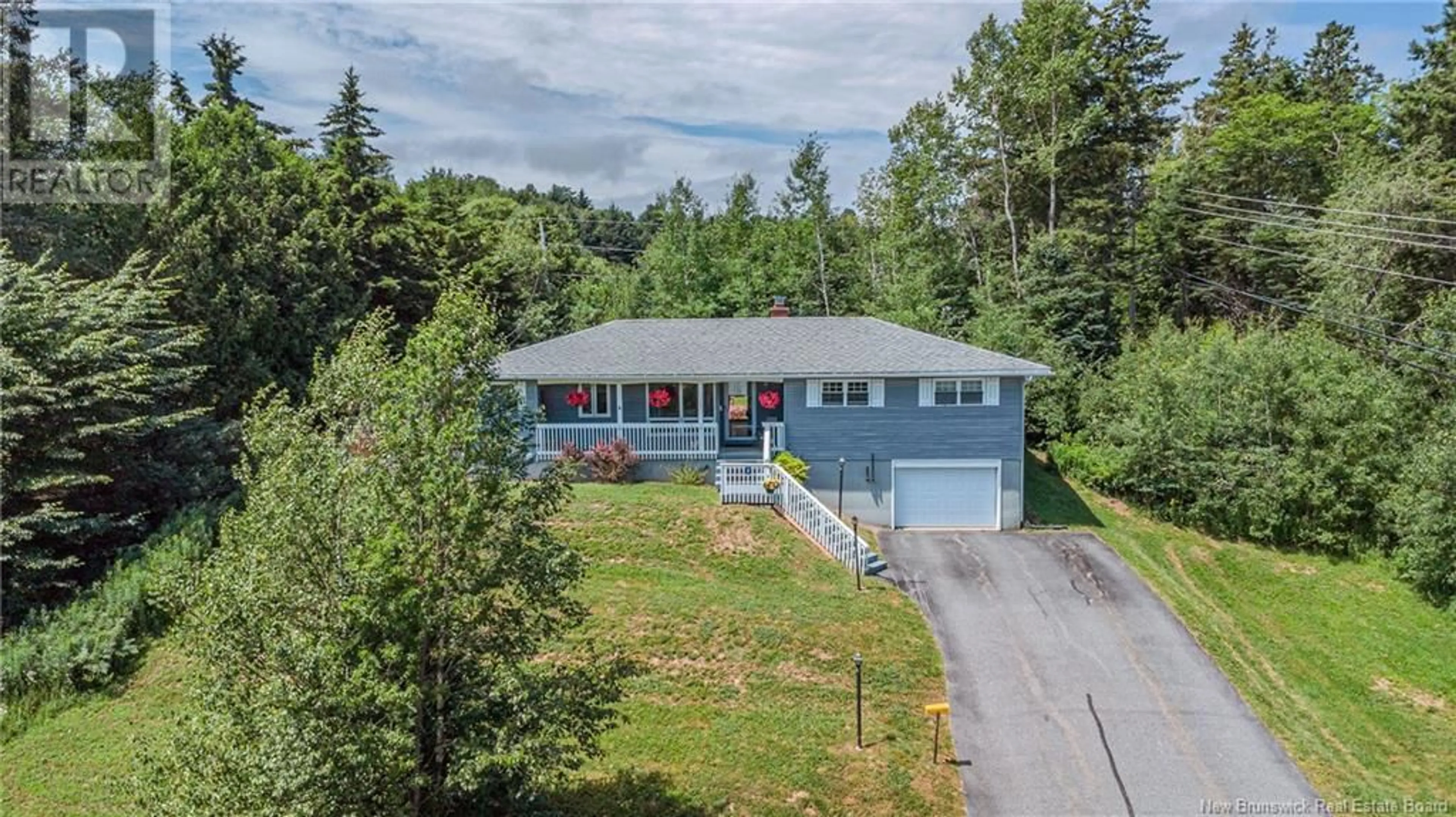 A pic from outside/outdoor area/front of a property/back of a property/a pic from drone, unknown for 2 COLONIAL DRIVE, Quispamsis New Brunswick E2G1A6