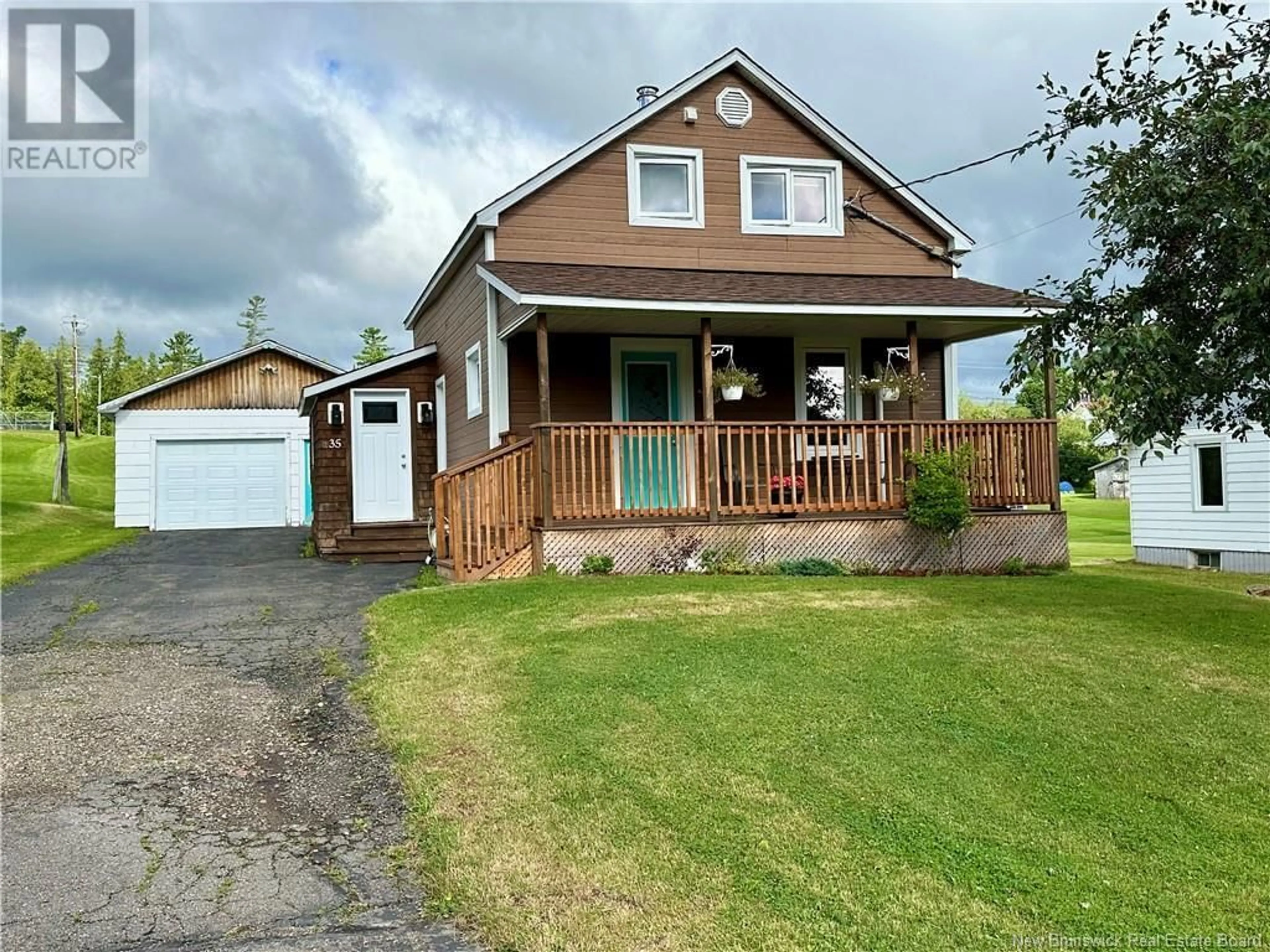 Home with vinyl exterior material, street for 35 ROULSTON AVENUE, Plaster Rock New Brunswick E7G2R3