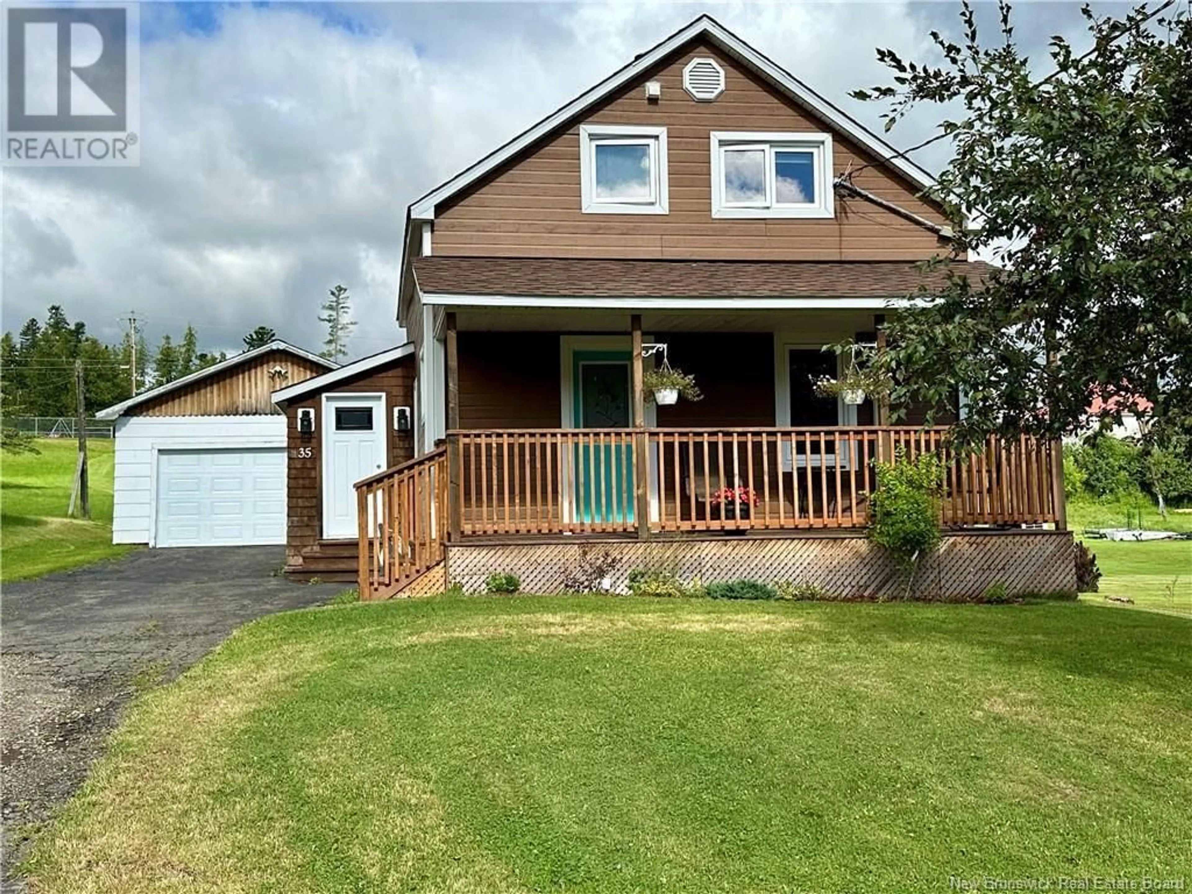 Home with vinyl exterior material, street for 35 ROULSTON AVENUE, Plaster Rock New Brunswick E7G2R3