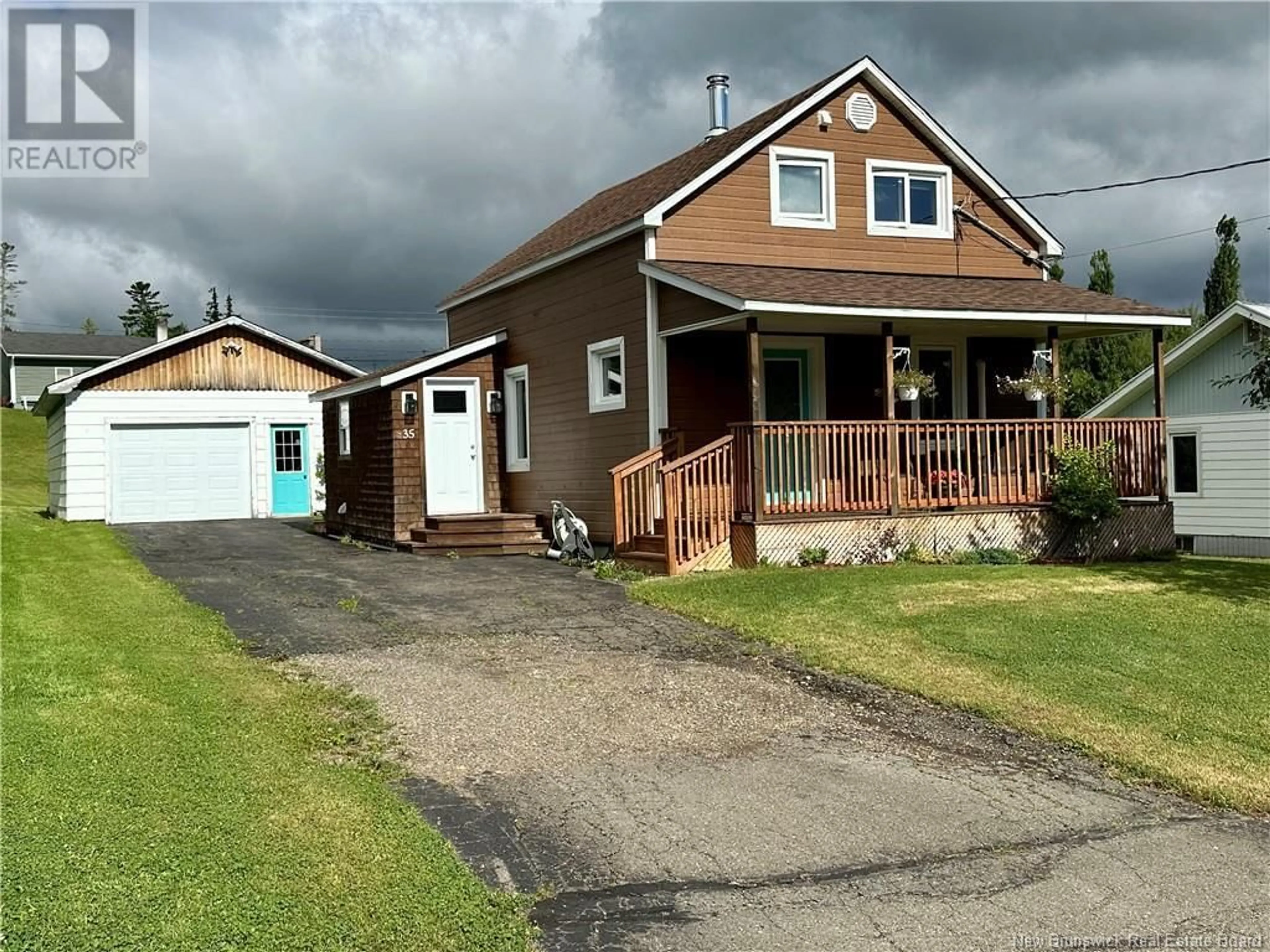 A pic from outside/outdoor area/front of a property/back of a property/a pic from drone, street for 35 ROULSTON AVENUE, Plaster Rock New Brunswick E7G2R3