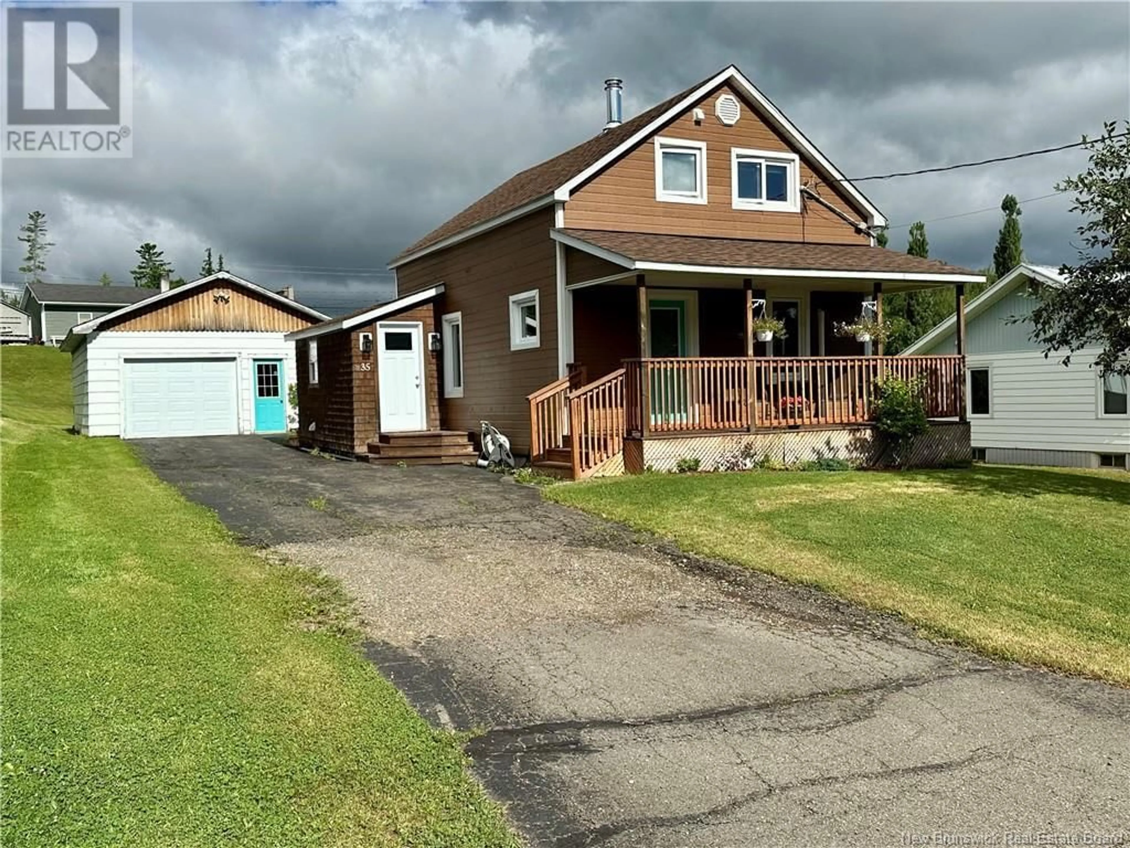 A pic from outside/outdoor area/front of a property/back of a property/a pic from drone, street for 35 ROULSTON AVENUE, Plaster Rock New Brunswick E7G2R3