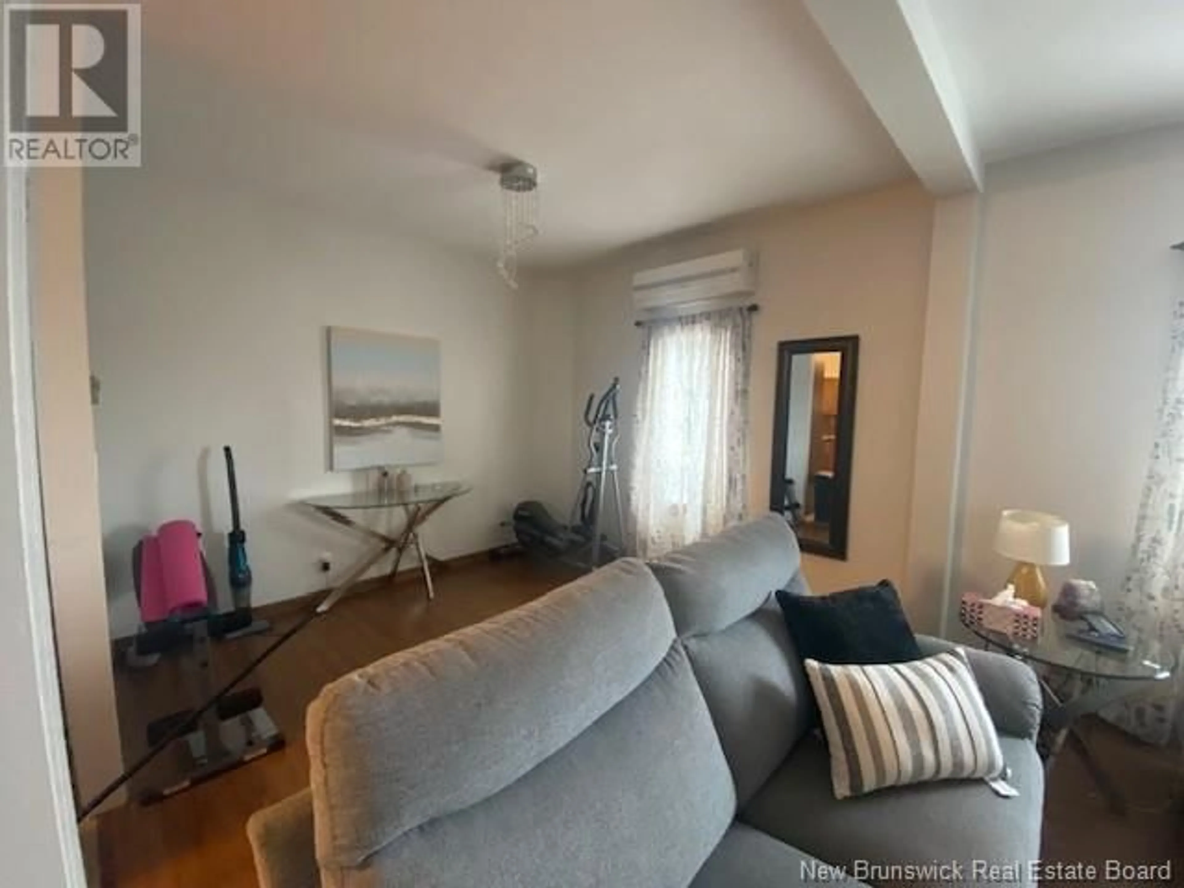 Living room with furniture, unknown for 61 PRINCE WILLIAM STREET, Campbellton New Brunswick E3N1Y1