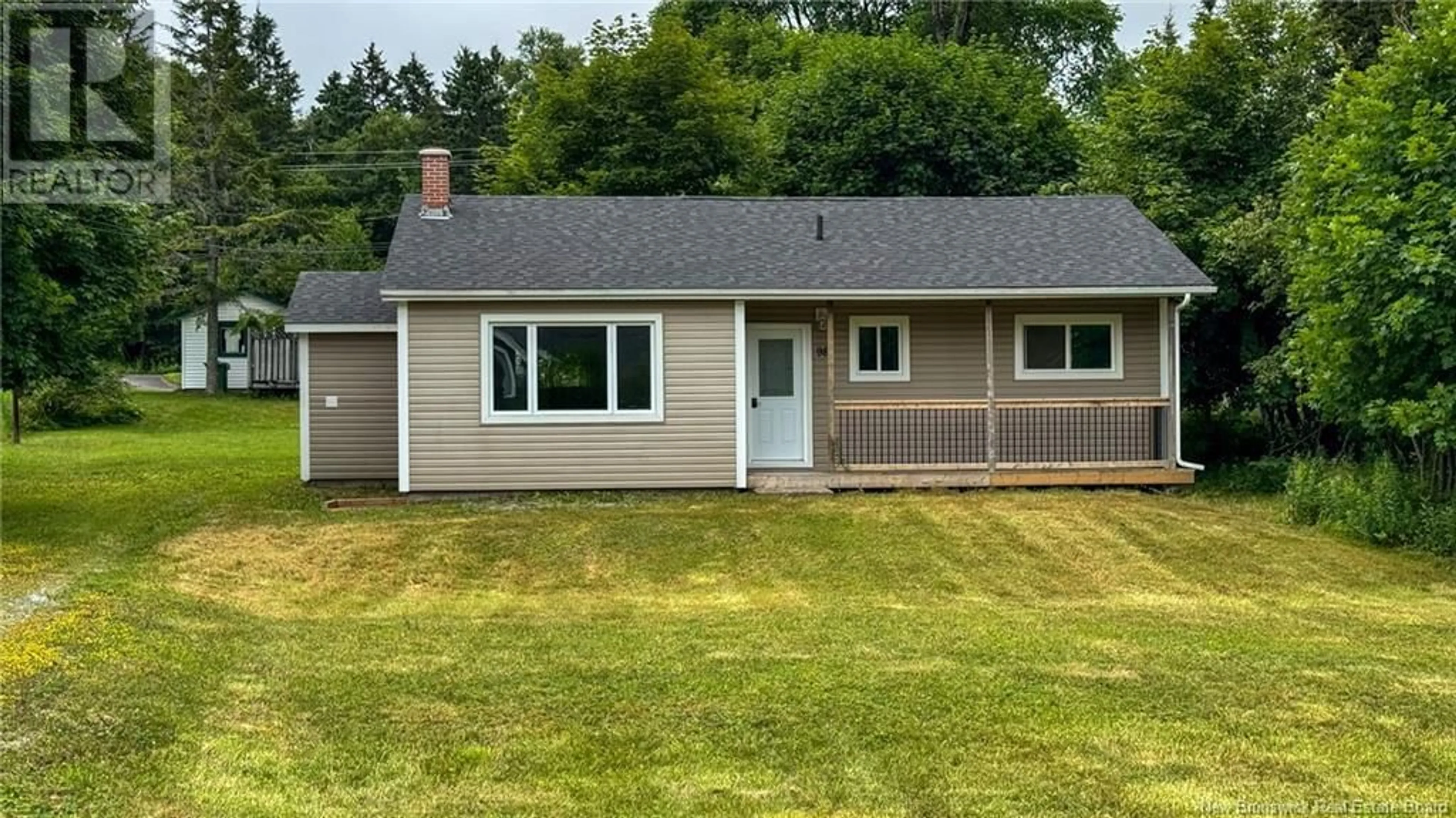 Home with vinyl exterior material, street for 98 NEIL STREET, Rothesay New Brunswick E2H1J6