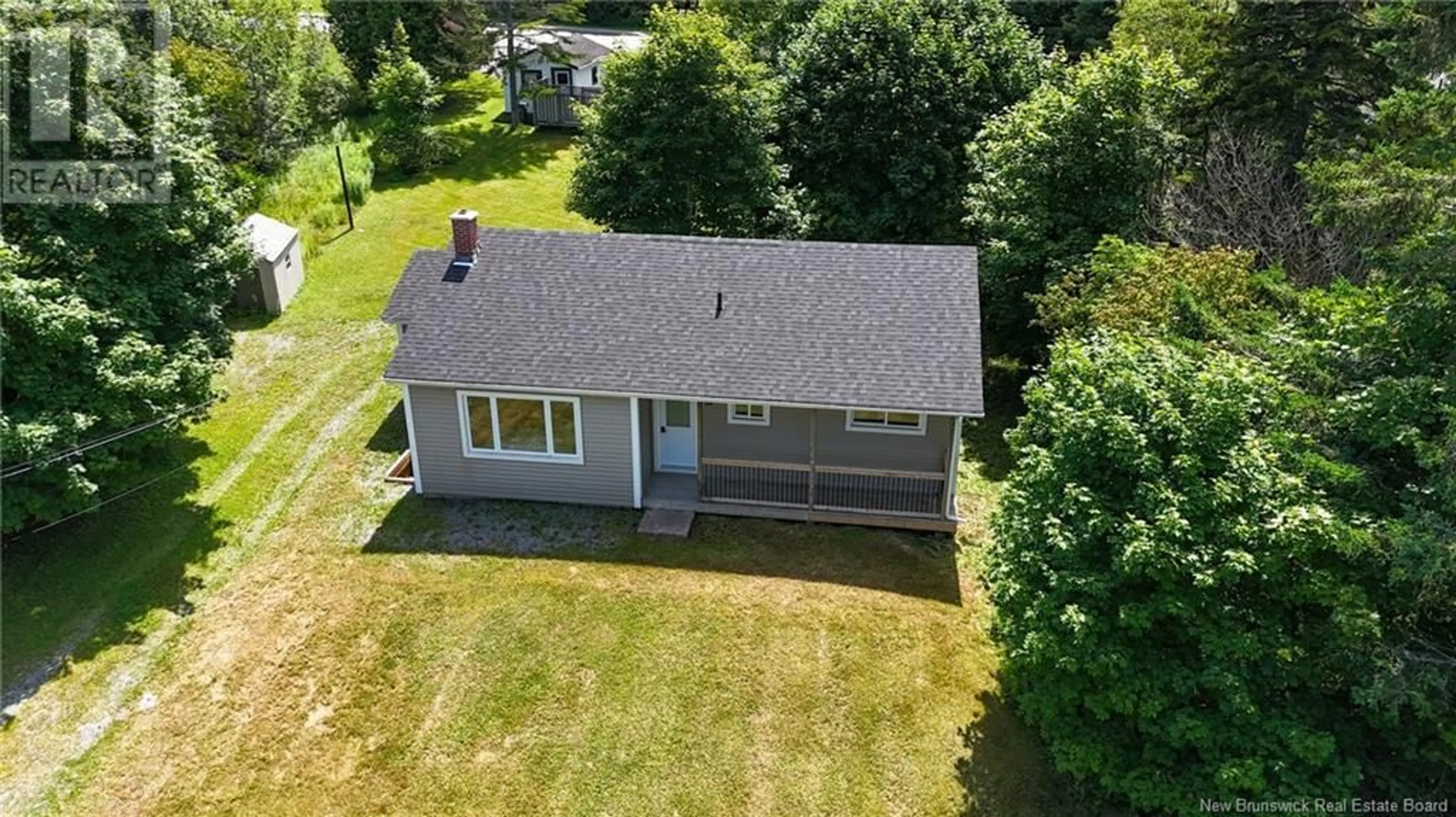 A pic from outside/outdoor area/front of a property/back of a property/a pic from drone, building for 98 NEIL STREET, Rothesay New Brunswick E2H1J6