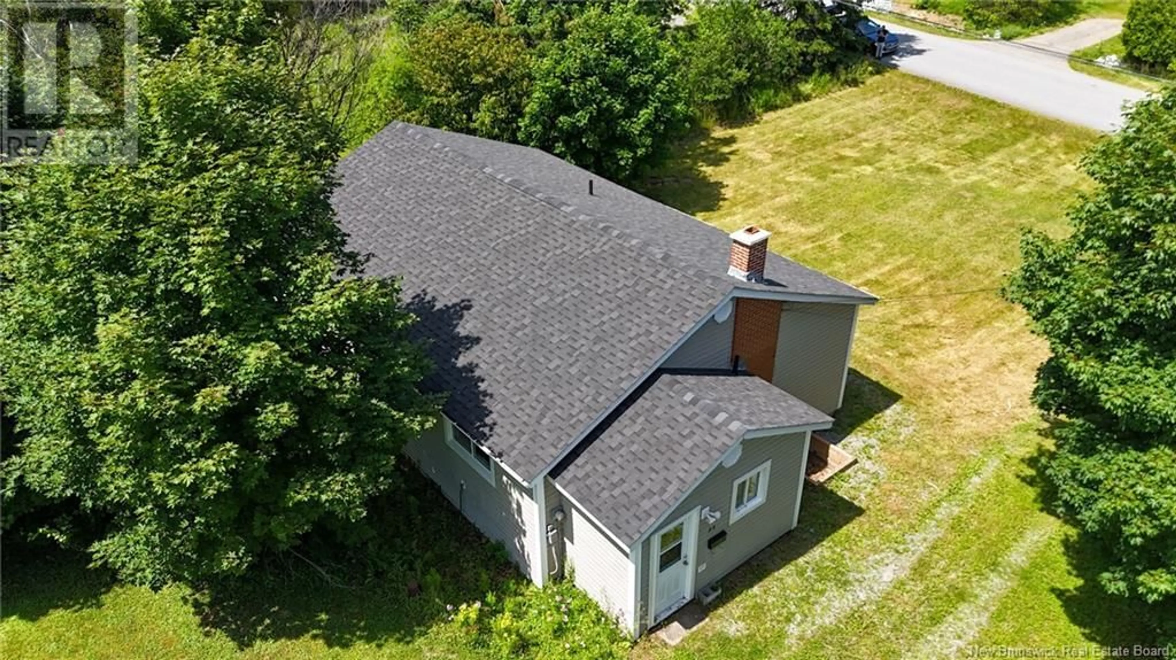A pic from outside/outdoor area/front of a property/back of a property/a pic from drone, building for 98 NEIL STREET, Rothesay New Brunswick E2H1J6